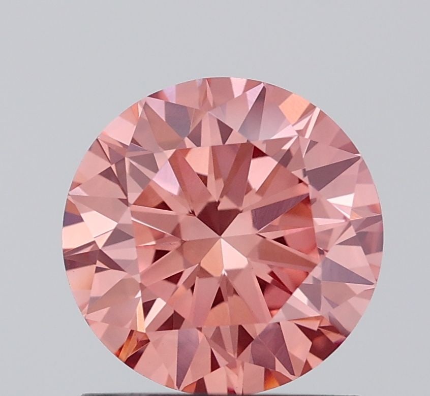 IGI Round 1.13ct Fancy Vivid Brownish Pink VVS2 Loose Lab Diamond: IGI Round 1.13ct Fancy Vivid Brownish Pink VVS2 Loose Lab Diamond Experience the beauty of nature with this stunning, lab-grown diamond, boasting an EX cut and VVS2 clarity for exceptional brilliance