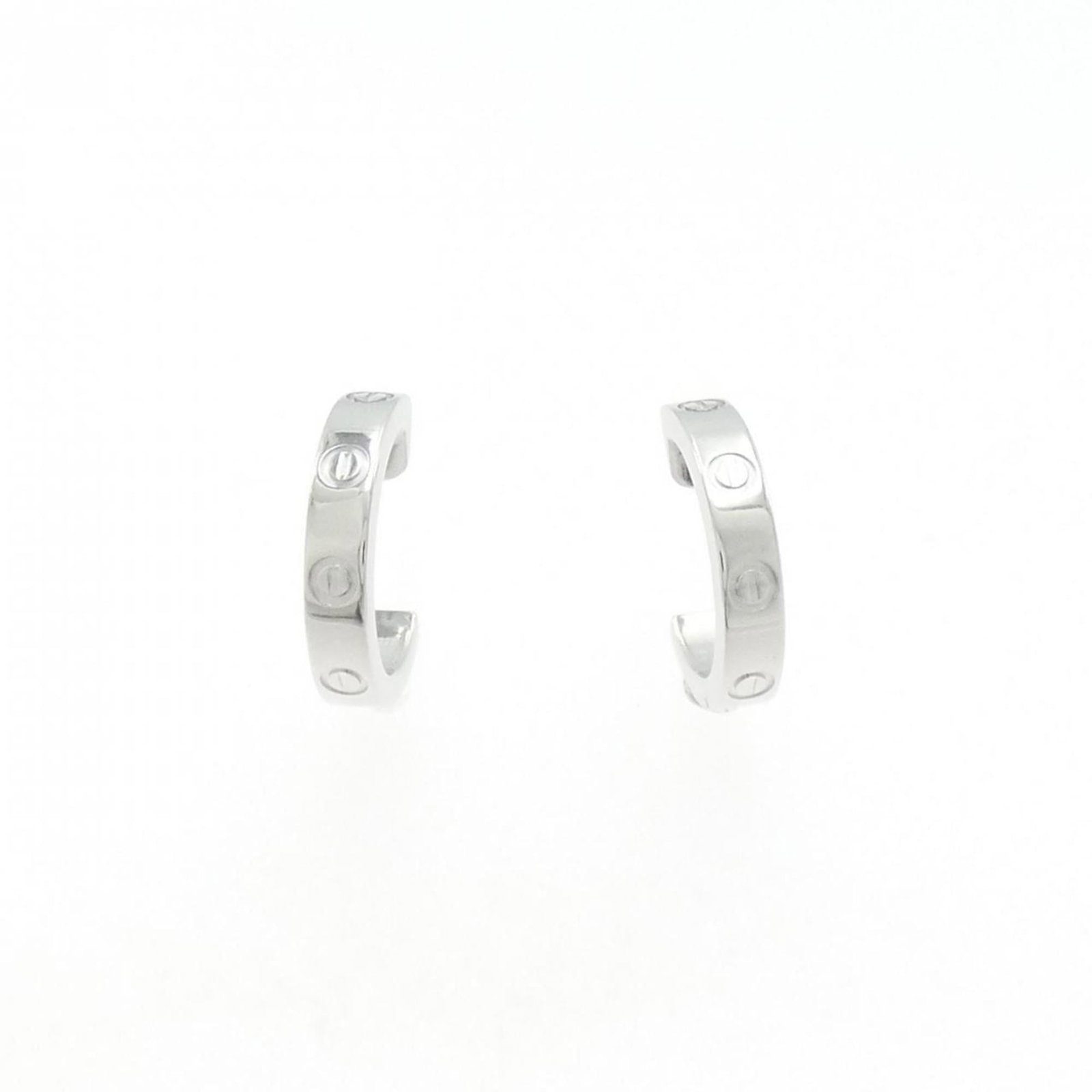 Cartier 18k White Gold Hoop Earrings: Cartier 18k White Gold Hoop Earrings Elevate your style with these stunning 18k white gold hoop earrings from Cartier, featuring a sleek and timeless design that exudes luxury. With a subtle weight an