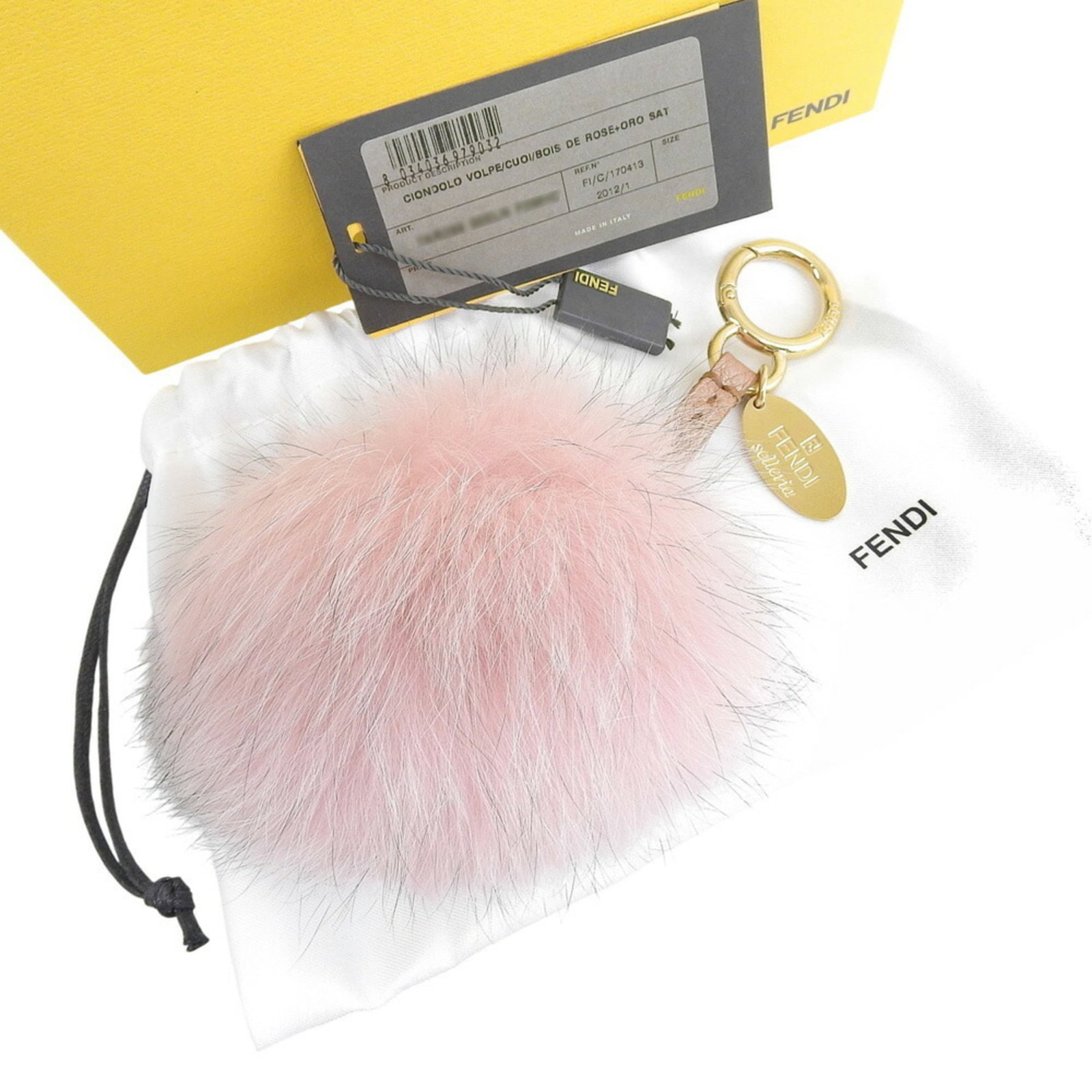 Fur Fendi Handbag Charm: Fur Fendi Handbag Charm Add a touch of luxury to your handbag collection with this exquisite Fendi fur charm, featuring a vibrant pink hue and made from high-quality fur. This stylish accessory is har
