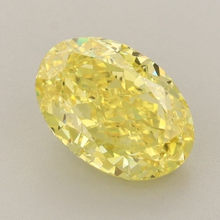 IGI Oval 1.62ct Fancy Vivid Yellow VVS2 Loose Lab Diamond: IGI Oval 1.62ct Fancy Vivid Yellow VVS2 Loose Lab Diamond Experience the vibrant beauty of nature in this stunning 1.62ct Fancy Vivid Yellow VVS2 lab diamond, certified by the International