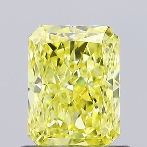 IGI Radiant 0.9ct Fancy Vivid Yellow VVS2 Loose Lab Diamond: IGI Radiant 0.9ct Fancy Vivid Yellow VVS2 Loose Lab Diamond Experience the vibrant beauty of nature in a lab-grown diamond, certified by IGI as Fancy Vivid Yellow with exceptional clarity and cut. Thi