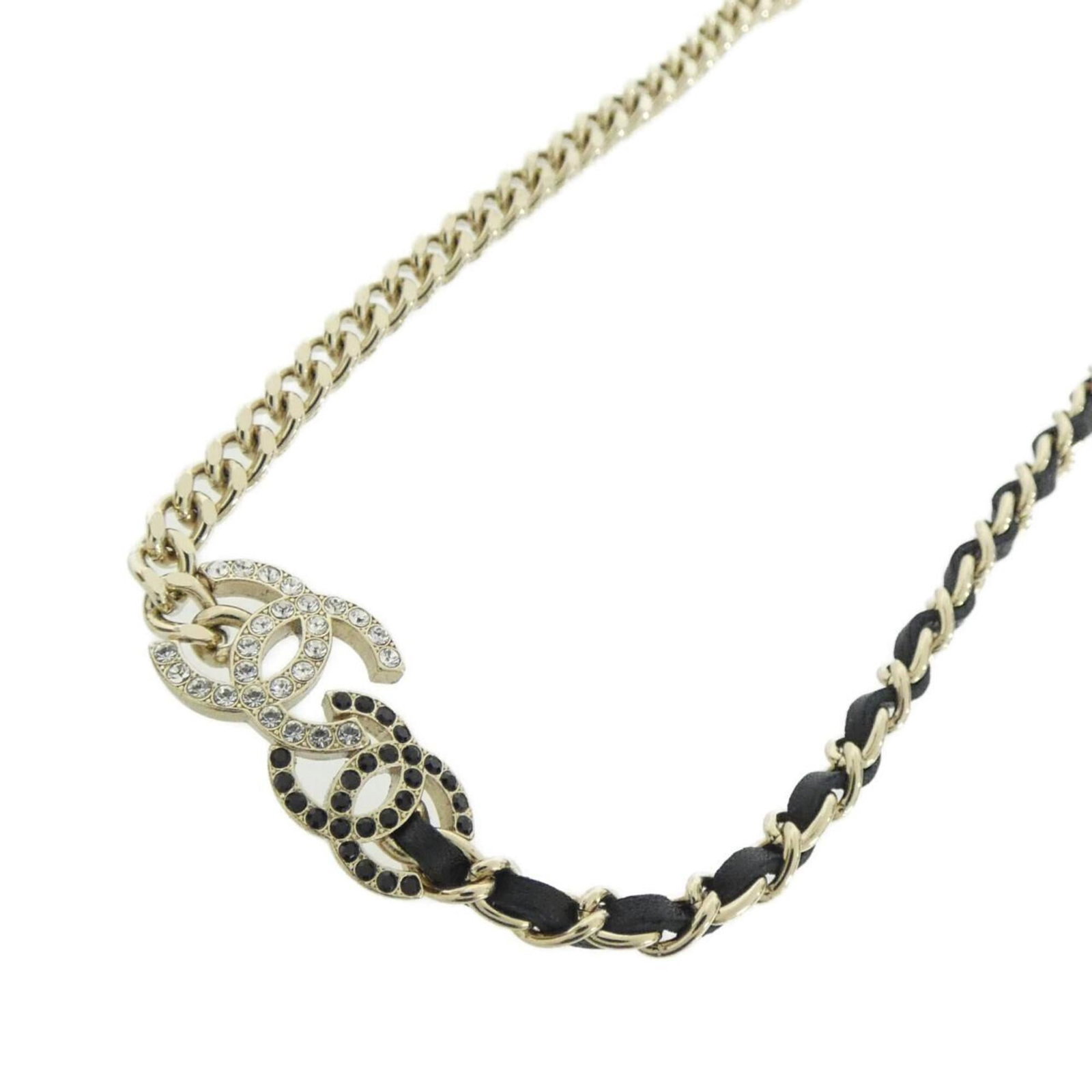 Chanel AB9278 Necklace: Chanel AB9278 Necklace A sleek and sophisticated Chanel necklace, this black leather cuff adorned with gold-toned hardware and crystal accents adds a touch of timeless elegance to any outfit. With its