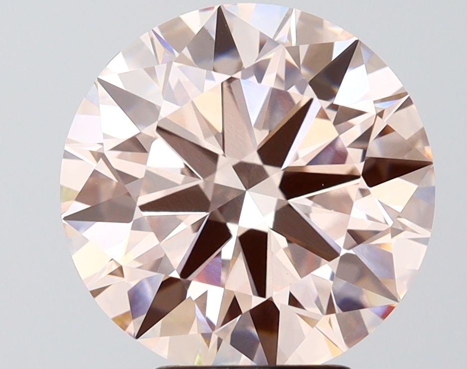 IGI Round 5.01ct Fancy Pink VVS2 Ideal Loose Lab Diamond: IGI Round 5.01ct Fancy Pink VVS2 Ideal Loose Lab Diamond Experience the rare beauty of a Fancy Pink diamond, one of the most coveted colors in the world of gemstones. This 5.01ct IGI-certified lab-gro