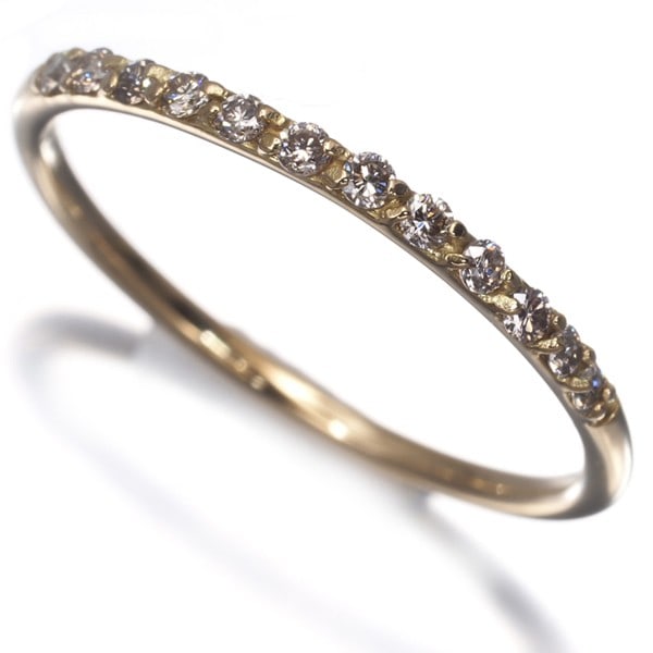 Gold Ahkah Ring Diamond 0.12Ct 12P Us5 18K 750 Yellow: Gold Ahkah Ring Diamond 0.12Ct 12P Us5 18K 750 Yellow Elevate your style with the stunning 0.12Ct diamond ring, set in a beautiful 18k yellow gold band. Crafted in Japan, this natural diamond ring boa