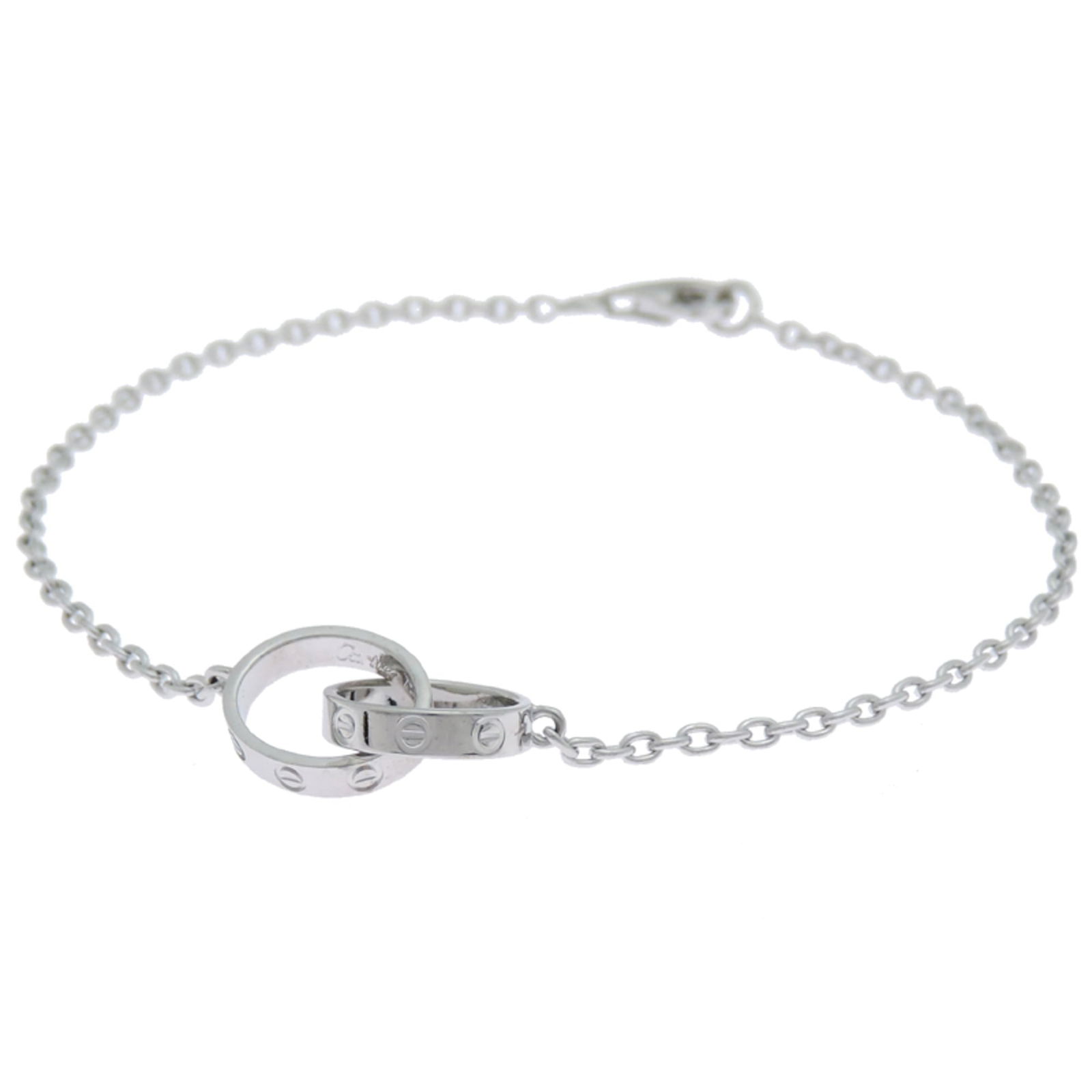 Cartier Charm Bracelet in 18k White Gold: Cartier Charm Bracelet in 18k White Gold A vintage Cartier charm bracelet in 18k white gold, exuding timeless elegance with its classic design and luxurious feel. With a length of 19cm, this versatile