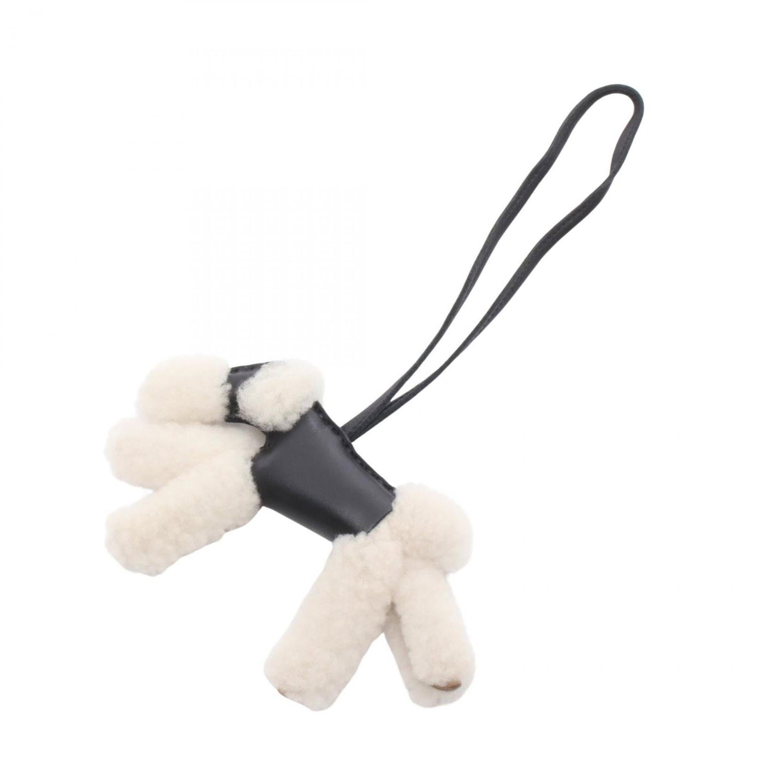 Hermes Agneau Milo Leather Handbag Charm: Hermes Agneau Milo Leather Handbag Charm A timeless piece from the iconic French house of Hermes, this Agneau Milo Leather Handbag Charm boasts the signature Mouton pattern in sleek black and white hu