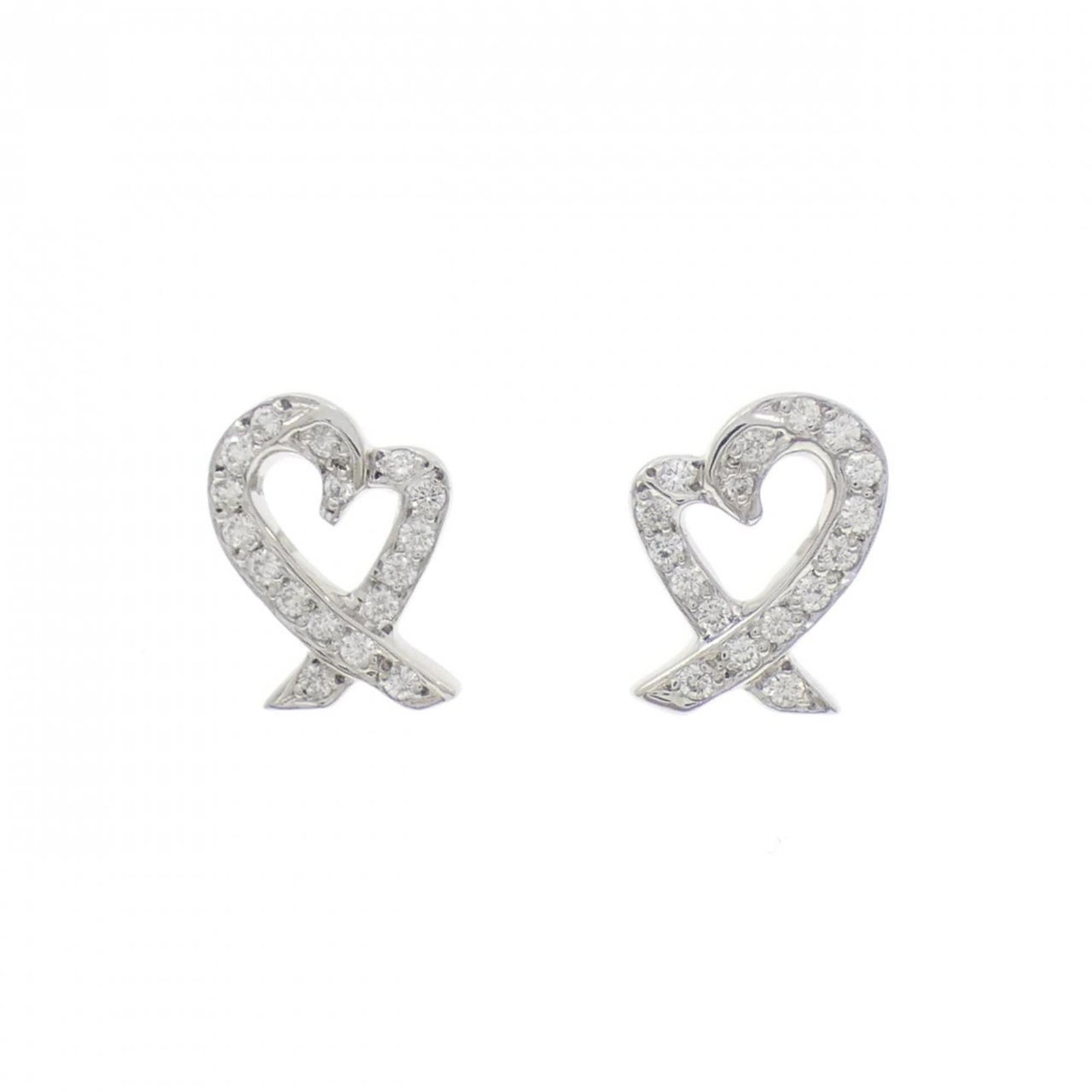 Tiffany Stud Earrings in Platinum 950: Tiffany Stud Earrings in Platinum 950 Elevate your elegance with these stunning Tiffany stud earrings, crafted from platinum 950 and adorned with a beautiful diamond stone. With their sleek design and