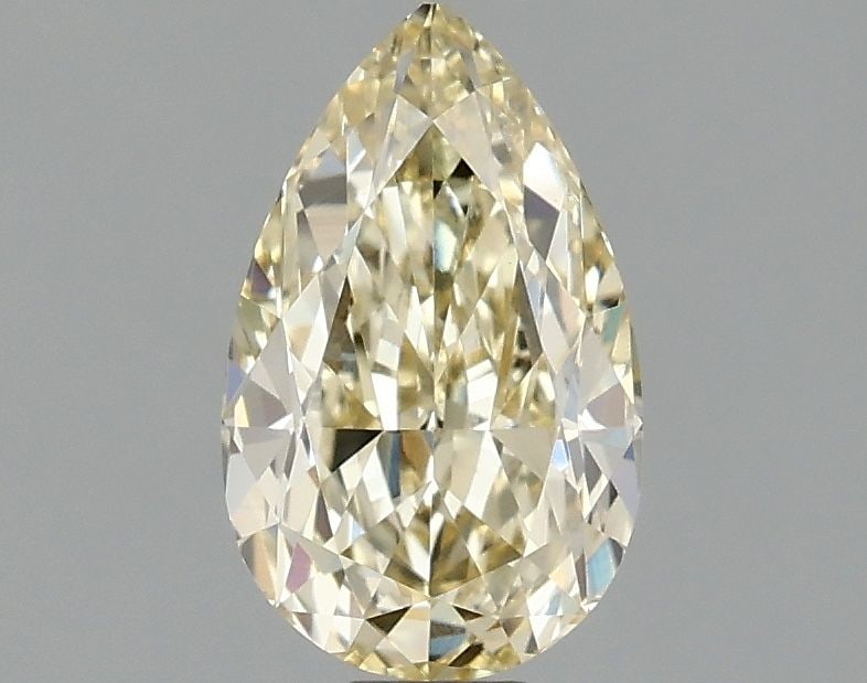 Loose Lab Diamond - IGI Pear 1.02ct Fancy Yellow VVS2: Loose Lab Diamond - IGI Pear 1.02ct Fancy Yellow VVS2 A rare and radiant gem, this 1.02ct Fancy Yellow Lab Diamond boasts exceptional clarity (VVS2) and luster (EX polish), giving it a truly unique