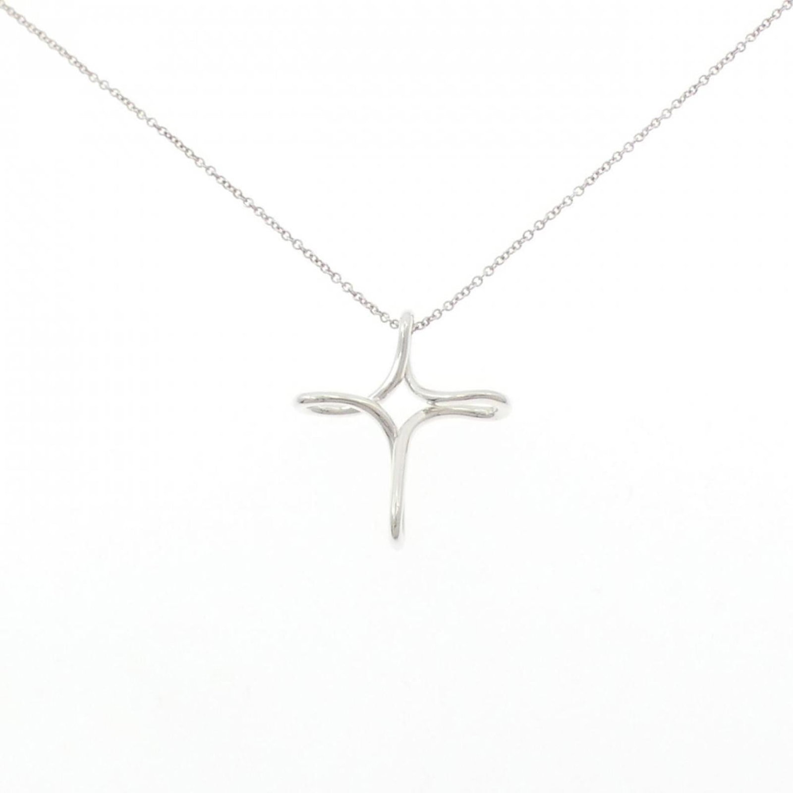 Necklace Tiffany Infinity Cross: Necklace Tiffany Infinity Cross Elevate your style with the timeless elegance of Tiffany's Infinity Cross necklace, crafted from sterling silver 925 and boasting a classic pendant design that symboliz