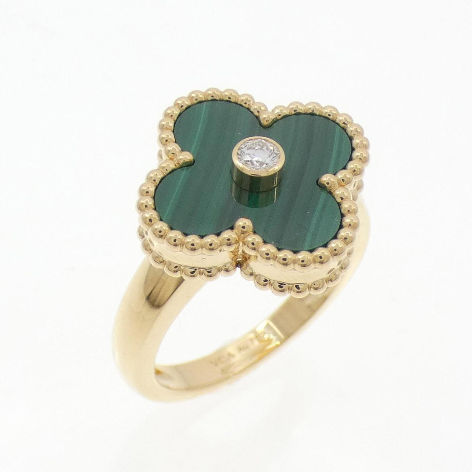 Van Cleef & Arpels 18k Yellow Gold Band Ring: Van Cleef & Arpels 18k Yellow Gold Band Ring A stunning Van Cleef & Arpels 18k yellow gold band ring, adorned with a sparkling diamond and unique malachite stone, adds a touch of elegance to any outfi