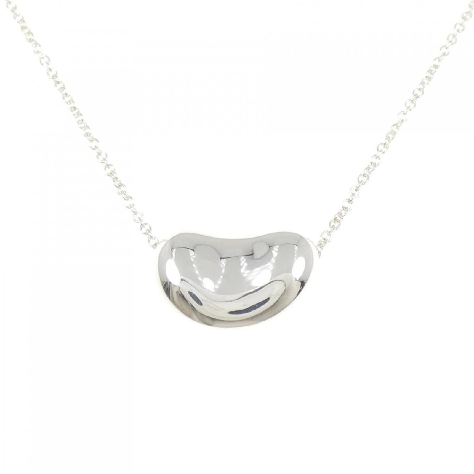 Necklace Tiffany Beans: Necklace Tiffany Beans A delicate and elegant Tiffany Beans necklace, crafted from sterling silver 925, adds a touch of sophistication to any outfit. With its subtle charm and understated elegance, th