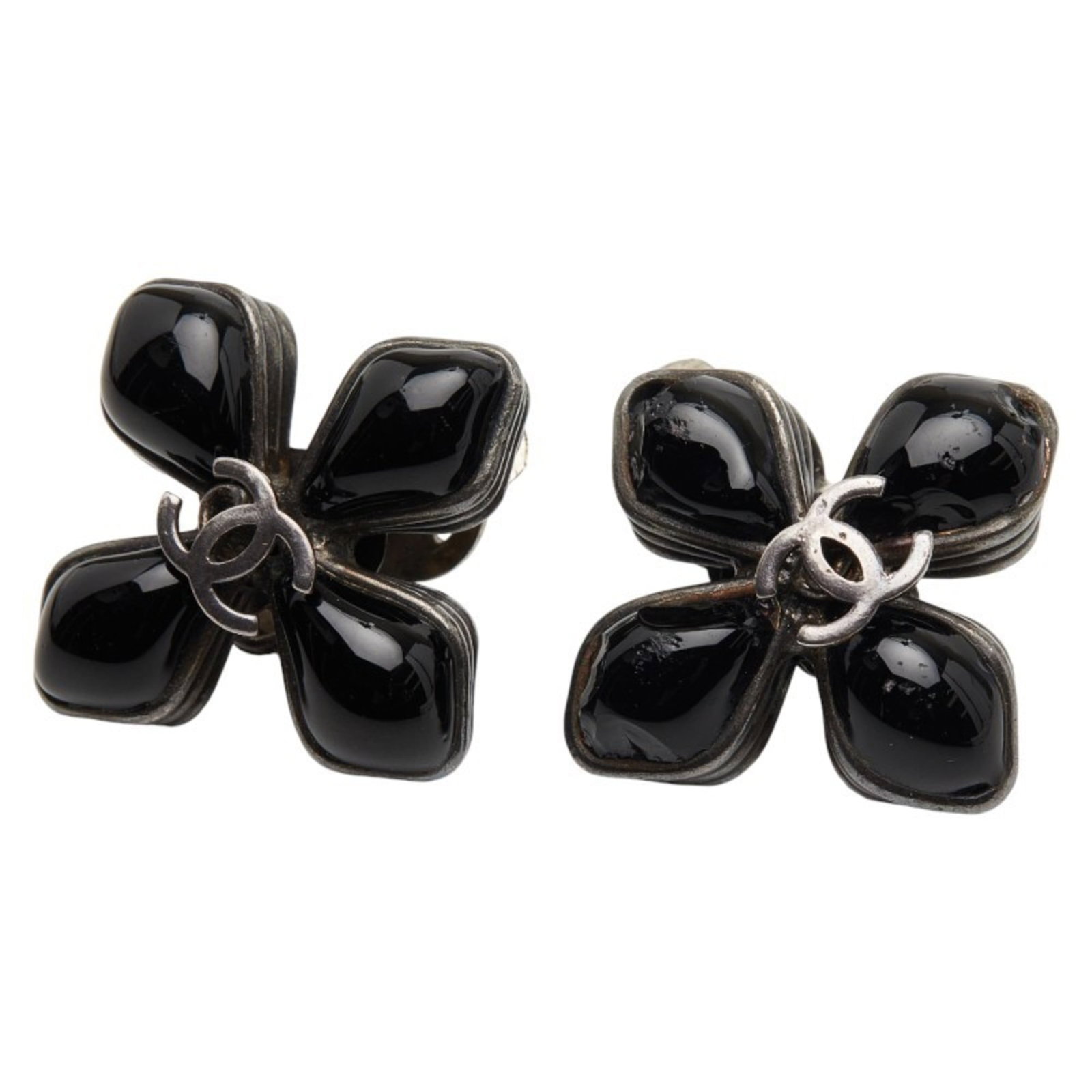 Earrings Chanel Clip: Earrings Chanel Clip Add a touch of timeless elegance to your outfit with these authentic Chanel clip earrings, boasting sleek silver accents and a chic black finish that exudes sophistication. With t