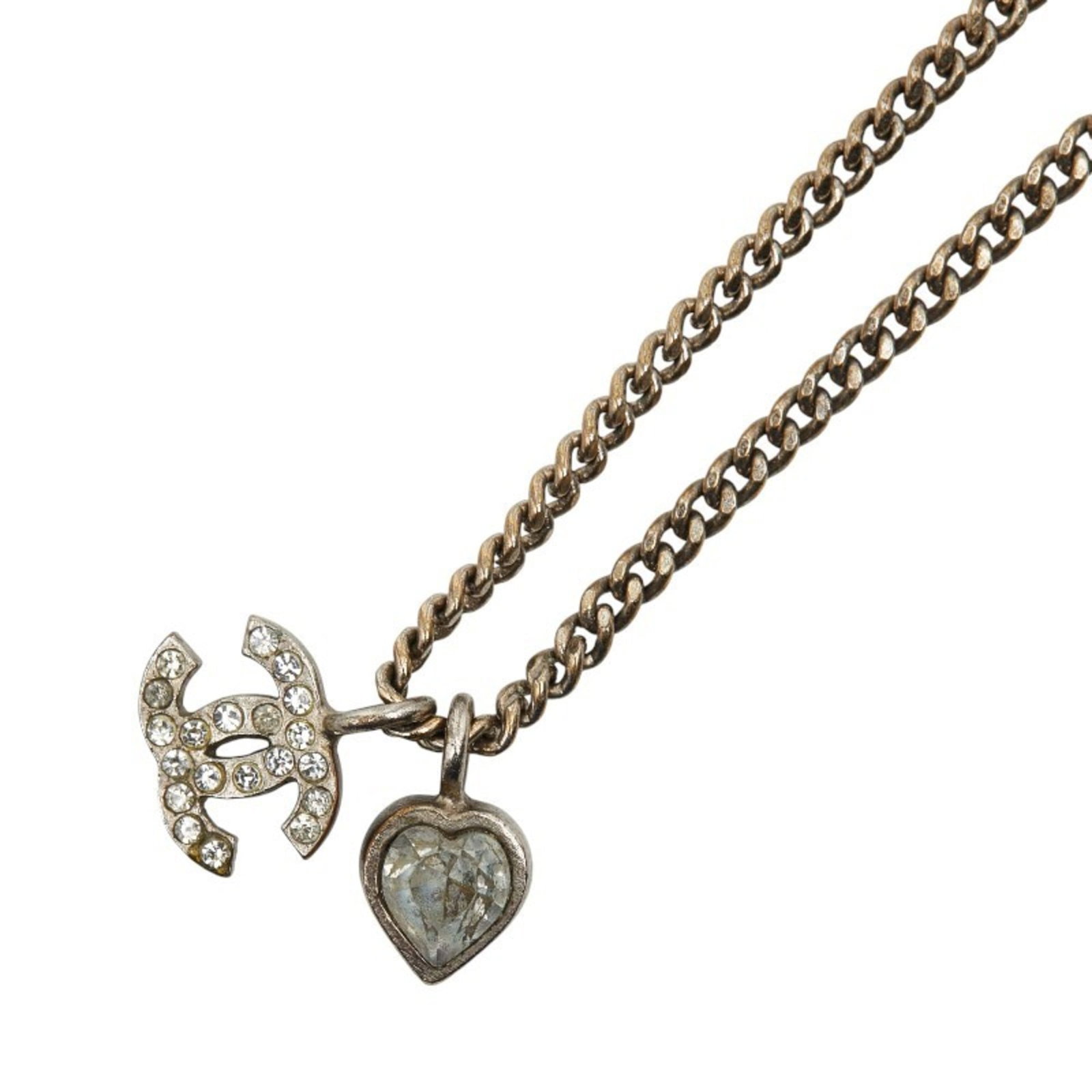 Women Chanel Coco Mark Heart Necklace in Silver with Rhinestones for: Women Chanel Coco Mark Heart Necklace in Silver with Rhinestones for A stunning Chanel Coco Mark Heart Necklace in silver, adorned with intricate rhinestones, adds a touch of timeless elegance to any