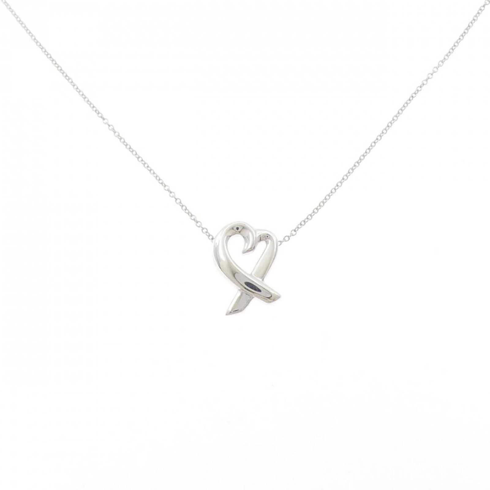 Loving Heart Small Tiffany Necklace: Loving Heart Small Tiffany Necklace Elevate your style with the timeless charm of a Tiffany Necklace, featuring a delicate 925 silver pendant in a classic design that exudes elegance and sophisticatio