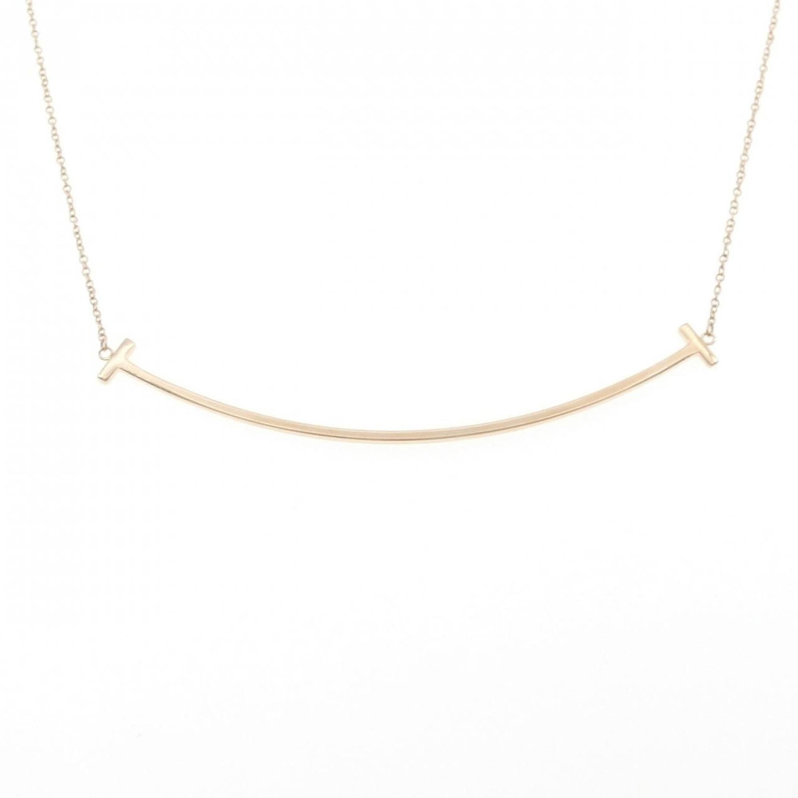 Necklace Tiffany T Smile Large: Necklace Tiffany T Smile Large Elevate your style with the iconic Tiffany T Smile Large necklace, crafted from 18K pink gold and boasting a sleek, modern design that exudes sophistication. With its su