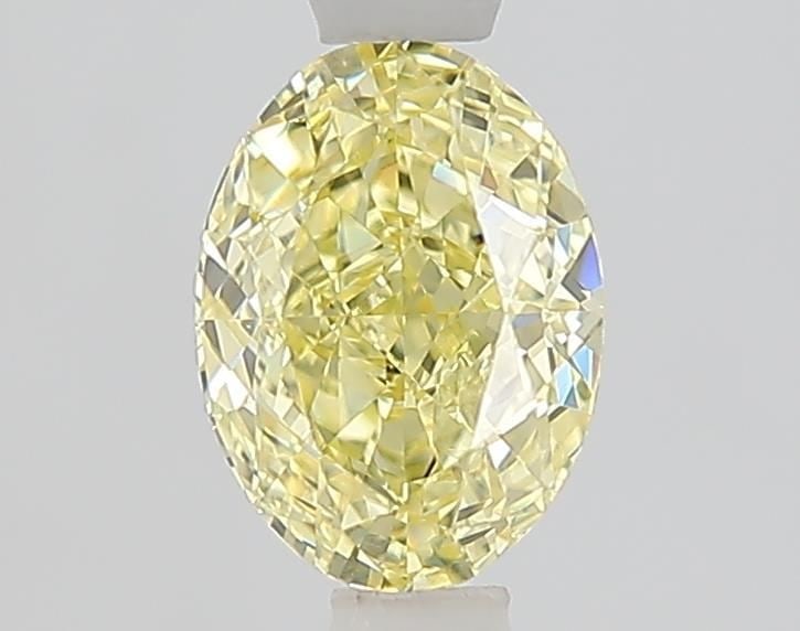IGI Oval 1.03ct Fancy Light Yellow VVS2 Loose Lab Diamond: IGI Oval 1.03ct Fancy Light Yellow VVS2 Loose Lab Diamond Experience the beauty of a lab-grown diamond, certified by IGI and boasting exceptional clarity with a VVS2 rating. This 1.03ct Fancy Light