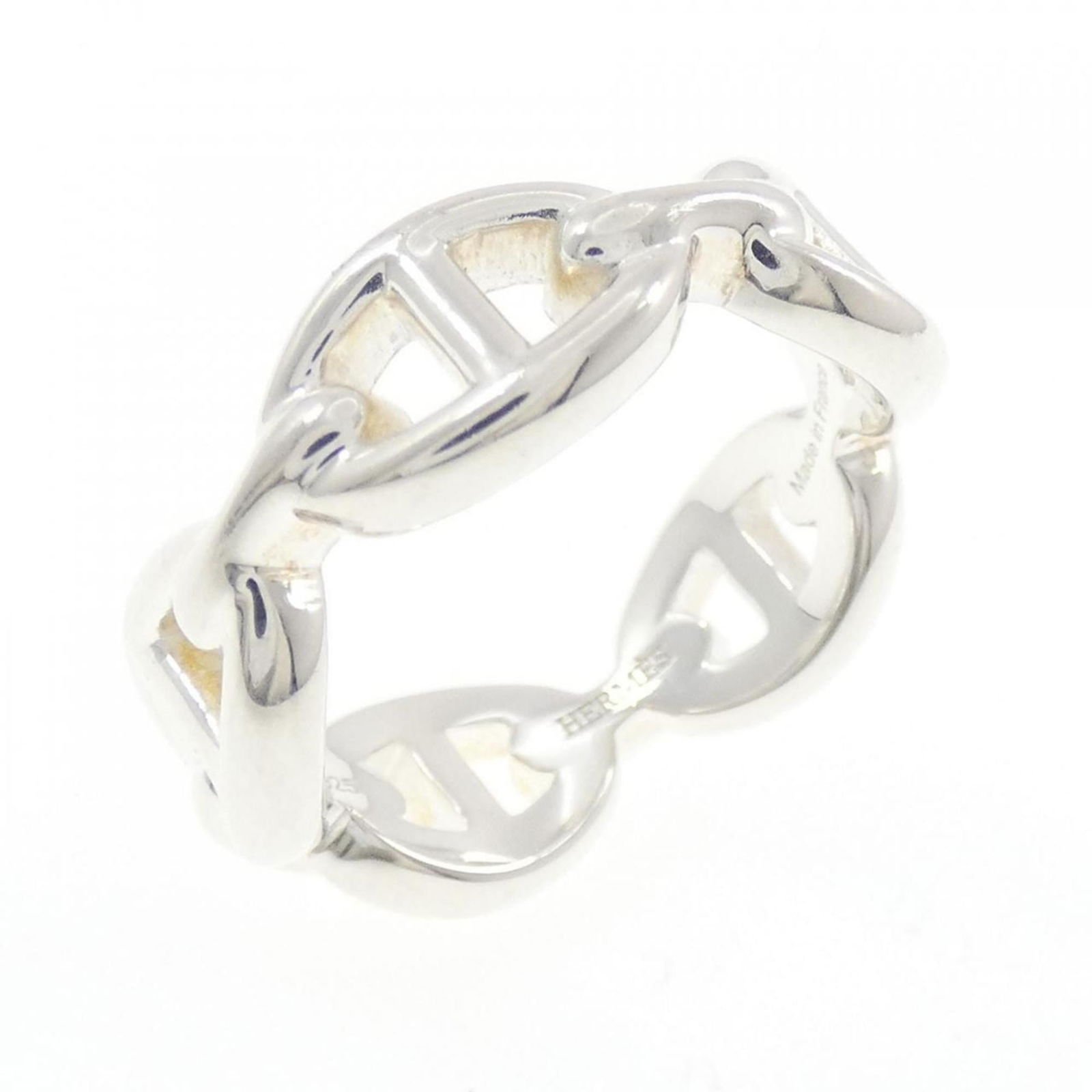 Hermes Silver 925 Band Ring: Hermes Silver 925 Band Ring A stunning silver band ring from the iconic French fashion house Hermes, this 925 sterling silver piece is perfect for adding a touch of elegance to any outfit. With its sl