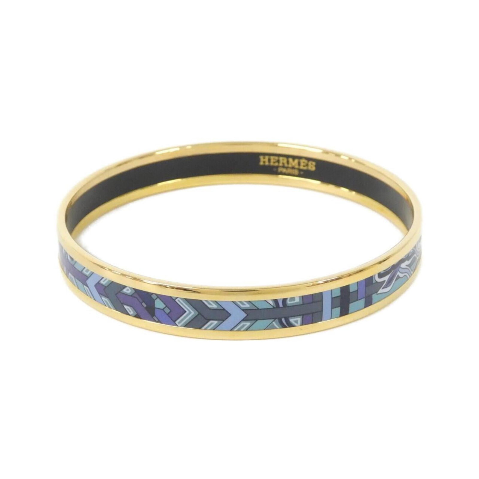 Bangle Hermes: Bangle Hermes A pre-owned Hermes bangle in stunning blue hues, measuring 19.5cm in length, adds a touch of sophistication to any outfit. With its classic design and high-quality craftsmanship, this