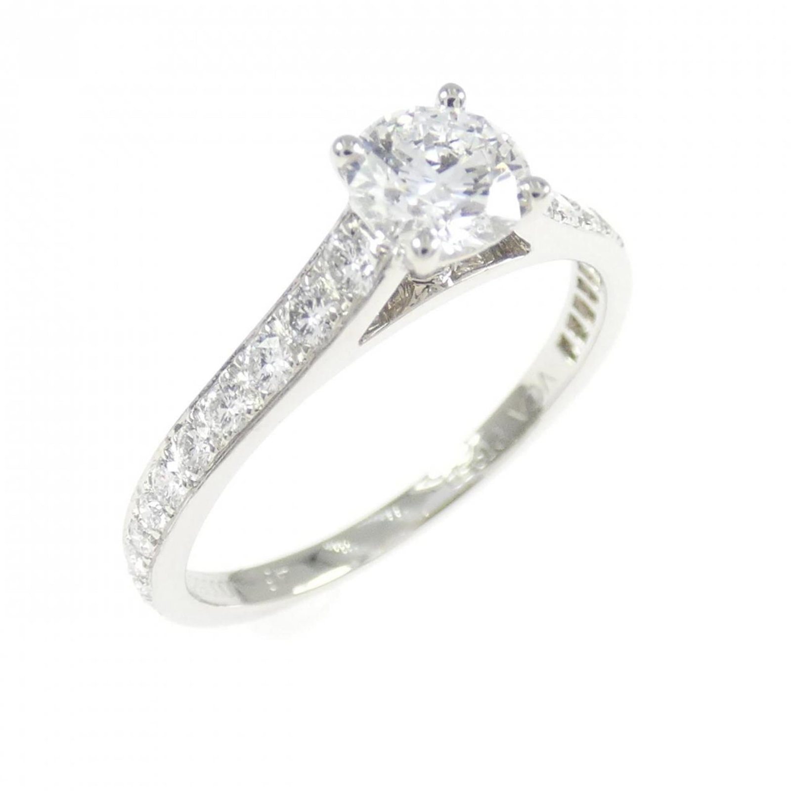 Van Cleef & Arpels Band Ring in Platinum 950: Van Cleef & Arpels Band Ring in Platinum 950 A stunning Van Cleef & Arpels band ring in platinum 950, adorned with a sparkling diamond, adds a touch of elegance to any outfit. This pre-loved beauty bo