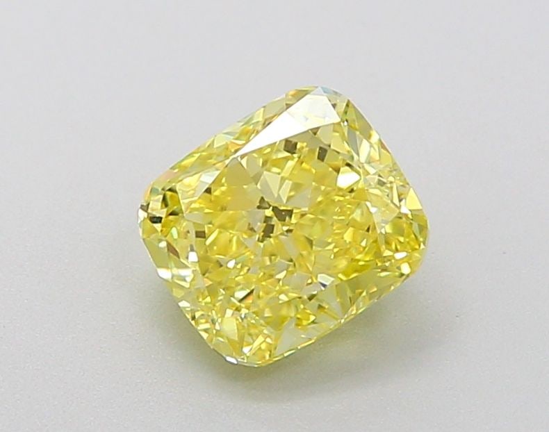 Loose Lab Diamond - IGI Cushion Modified 1.13ct Fancy Vivid Yellow VVS1: Loose Lab Diamond - IGI Cushion Modified 1.13ct Fancy Vivid Yellow VVS1 Experience the brilliance of a truly unique diamond, expertly certified by the International Gemological Institute (IGI) as a Fa