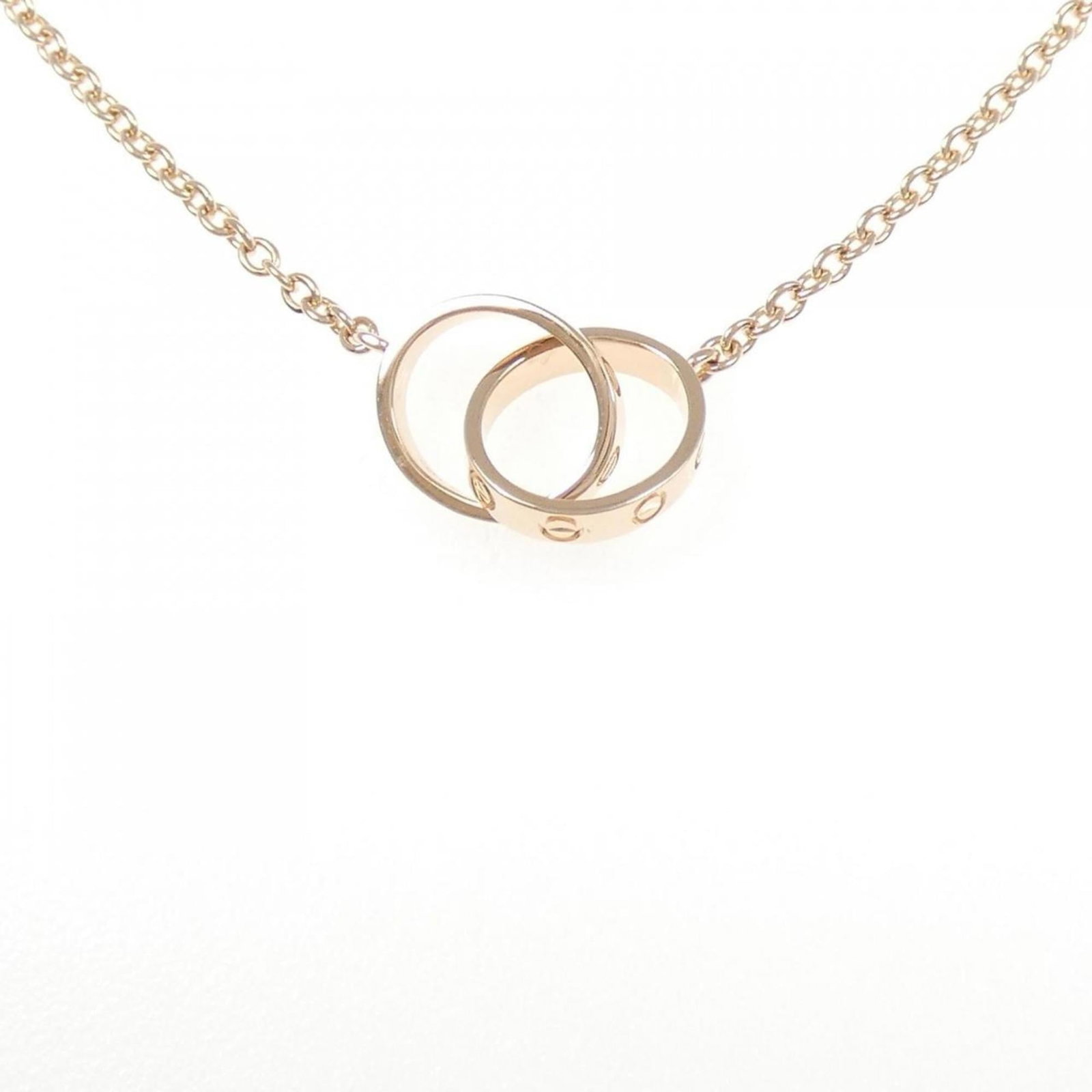 Necklace Cartier Baby Love: Necklace Cartier Baby Love The Cartier Baby Love necklace is a timeless and elegant piece, boasting 18K pink gold details that exude luxury and sophistication. Its delicate design and petite pendant m