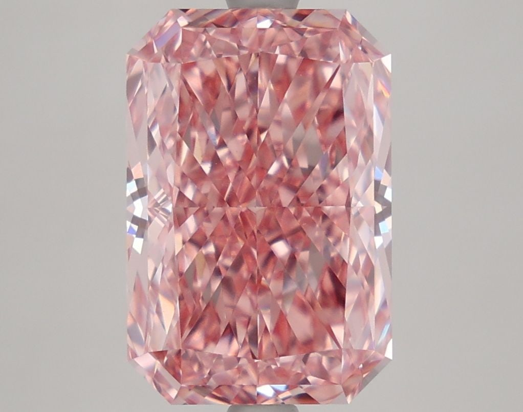 IGI Radiant 4.65ct Fancy Vivid Pink VVS2 Loose Lab Diamond: IGI Radiant 4.65ct Fancy Vivid Pink VVS2 Loose Lab Diamond Experience the rare beauty of a Fancy Vivid Pink diamond, one of the most coveted colors in the world of gemstones. This exquisite 4.65ct lab