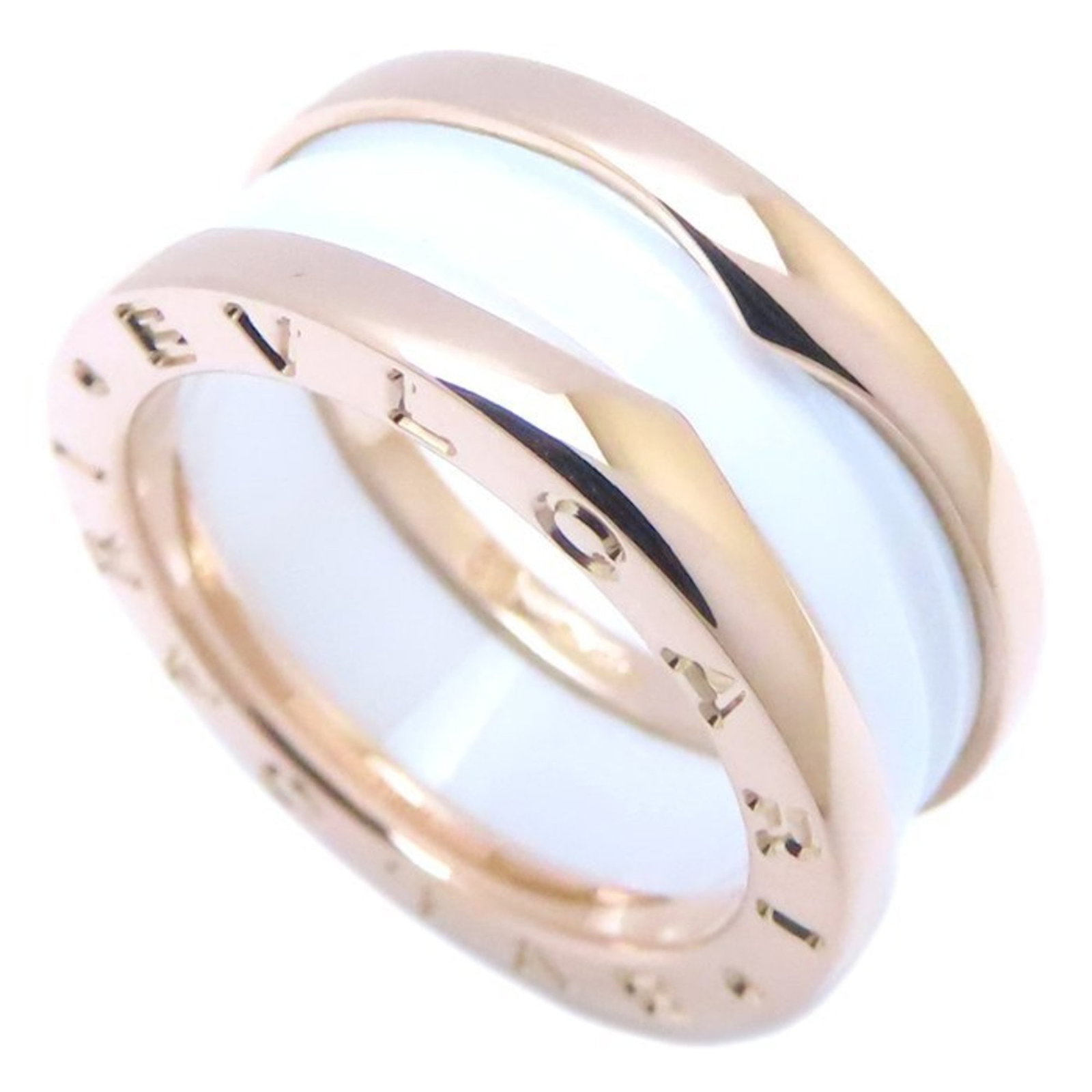 Bvlgari 18k Pink Gold Ceramic Band Ring: Bvlgari 18k Pink Gold Ceramic Band Ring Elevate your style with the Bvlgari 18k Pink Gold Ceramic Band Ring, a stunning piece that combines sleek ceramic details with luxurious pink gold accents. This