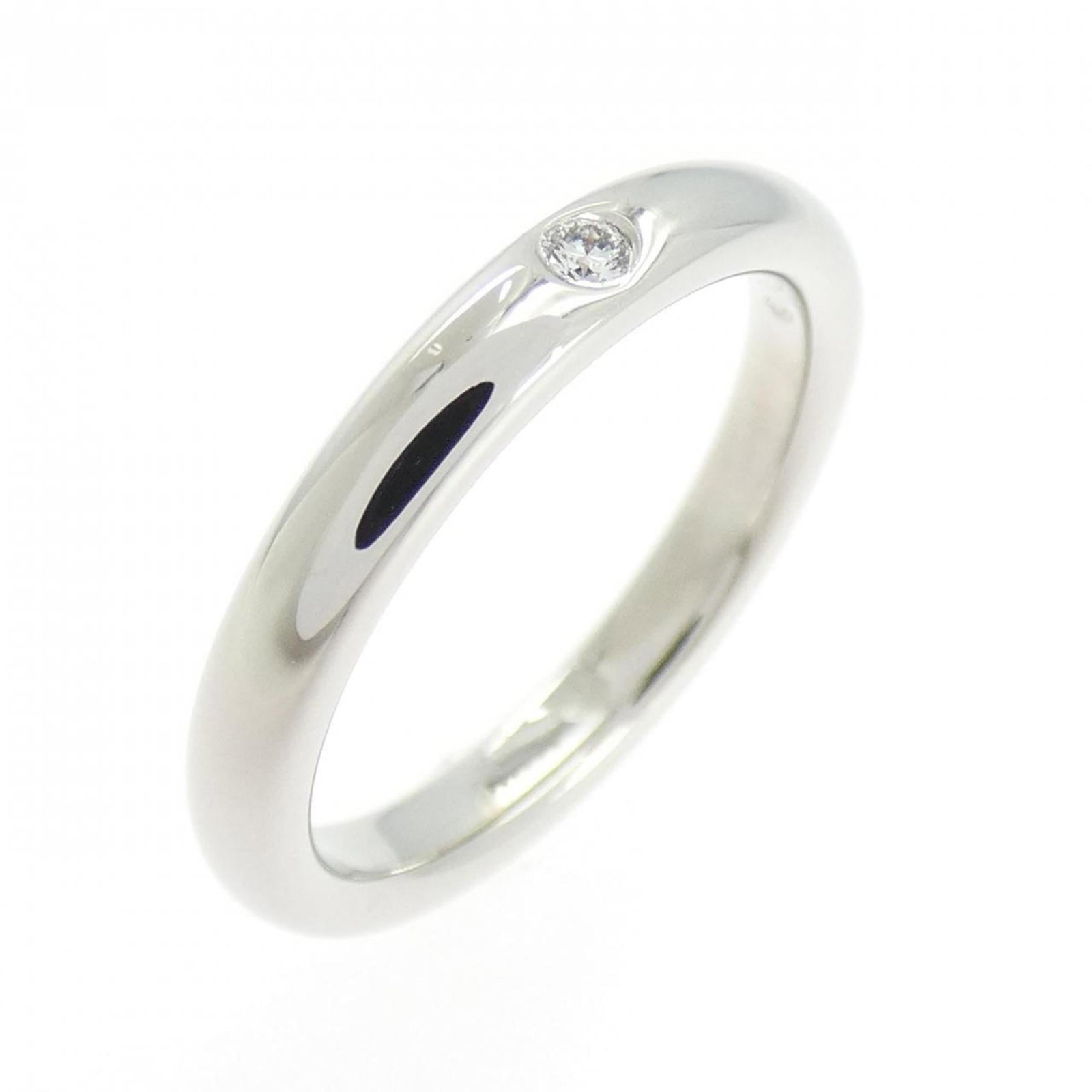 950 Tiffany Band Ring Platinum: 950 Tiffany Band Ring Platinum A stunning platinum band ring from Tiffany & Co., this 950 diamond-studded masterpiece boasts sleek lines and understated elegance, making it perfect for everyday wear.