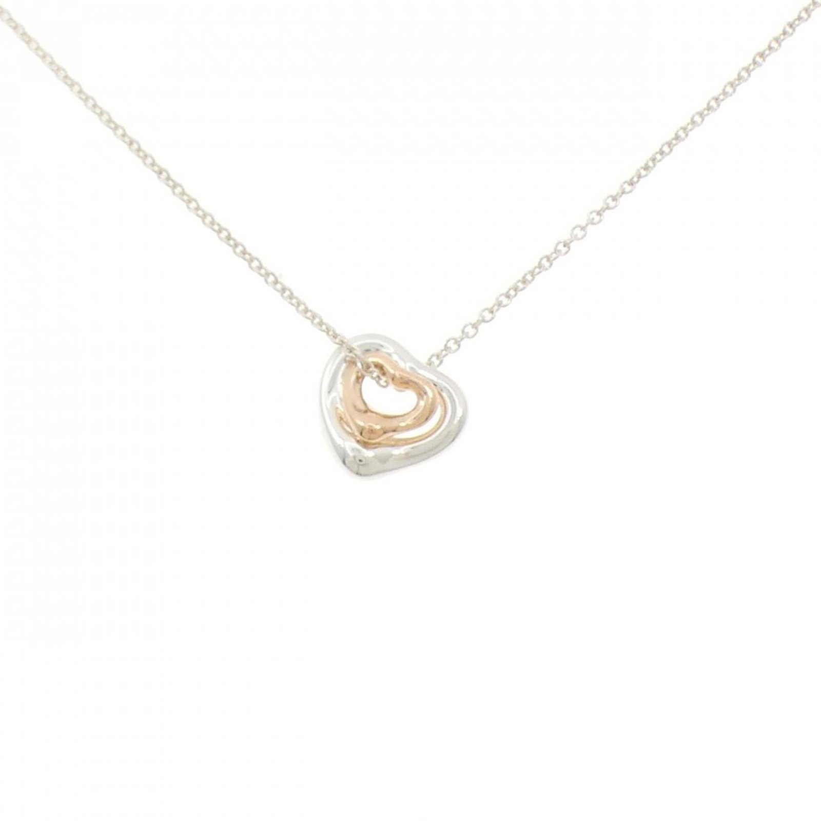 Necklace Tiffany Open Heart Extra Mini: Necklace Tiffany Open Heart Extra Mini Elegant and understated, the Tiffany Open Heart Extra Mini necklace is a timeless piece of pink gold (18K) jewelry that exudes sophistication. Its delicate 10.5m