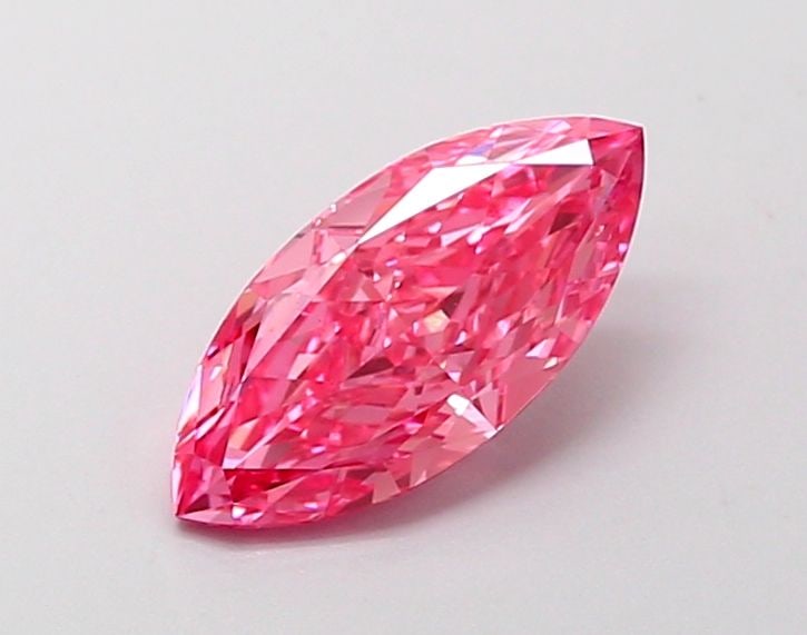 IGI Marquise 1.16ct Fancy Vivid Pink VVS2 Loose Lab Diamond: IGI Marquise 1.16ct Fancy Vivid Pink VVS2 Loose Lab Diamond A true gem for the discerning collector, this 1.16ct Fancy Vivid Pink lab-grown diamond boasts exceptional clarity (VVS2) and polish (EX), g