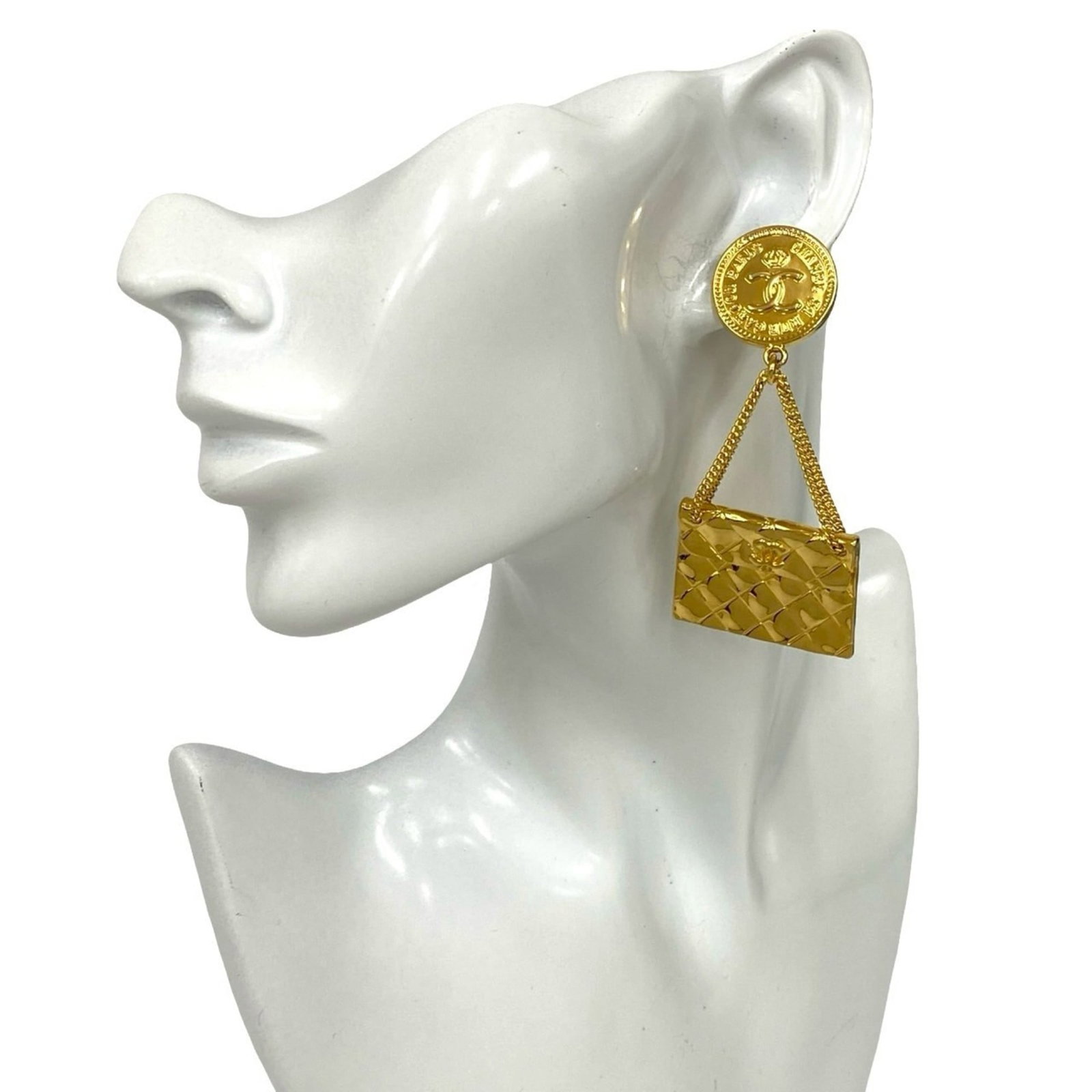 Chanel Clip Earrings in Gold Plating: Chanel Clip Earrings in Gold Plating Elevate your everyday style with these stunning Chanel clip earrings in gold plating, adding a touch of luxury to any outfit. With their sleek design and subtle sh