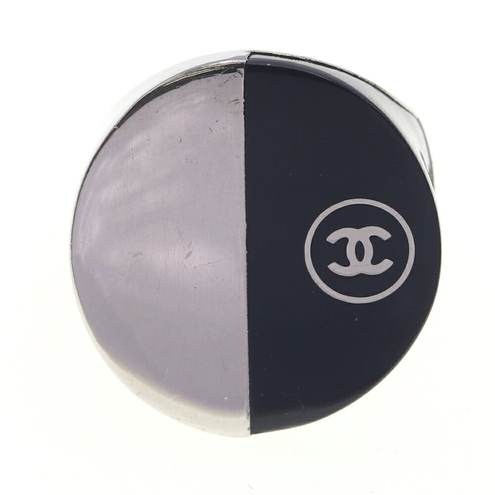 Chanel Band Ring in Metal: Chanel Band Ring in Metal A sleek and sophisticated silver band ring from the iconic Chanel brand, perfect for adding a touch of timeless elegance to any outfit. With its classic design and durable me