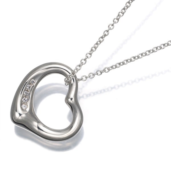 Tiffany & Co. Diamond Open Heart Necklace in 5P Silver 925: Tiffany & Co. Diamond Open Heart Necklace in 5P Silver 925 Elegance meets sophistication with the iconic Open Heart necklace by Elsa Peretti, crafted from sterling silver and adorned with a stunning n