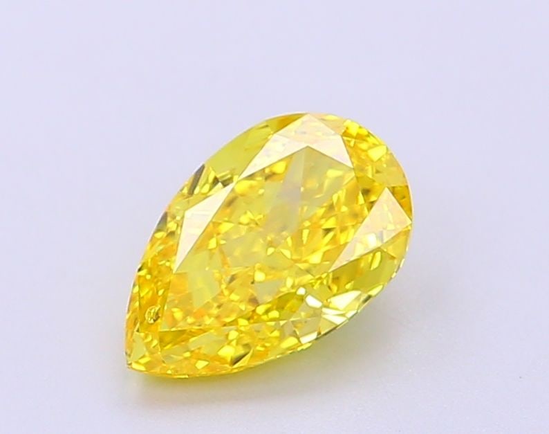Loose Lab Diamond - IGI Pear 1.19ct Fancy Vivid Yellow VVS1: Loose Lab Diamond - IGI Pear 1.19ct Fancy Vivid Yellow VVS1 Experience the brilliance of nature in a lab-grown diamond, certified by IGI as a Fancy Vivid Yellow with exceptional clarity and cut. This