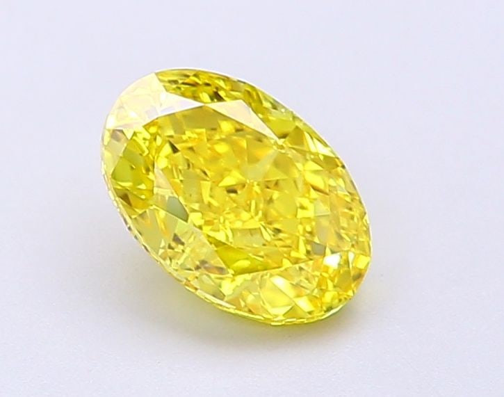 IGI Oval 1.1ct Fancy Vivid Yellow VVS2 Loose Lab Diamond: IGI Oval 1.1ct Fancy Vivid Yellow VVS2 Loose Lab Diamond Experience the radiant beauty of a lab-grown Fancy Vivid Yellow diamond, certified by IGI and boasting exceptional clarity (VVS2) and polish (E