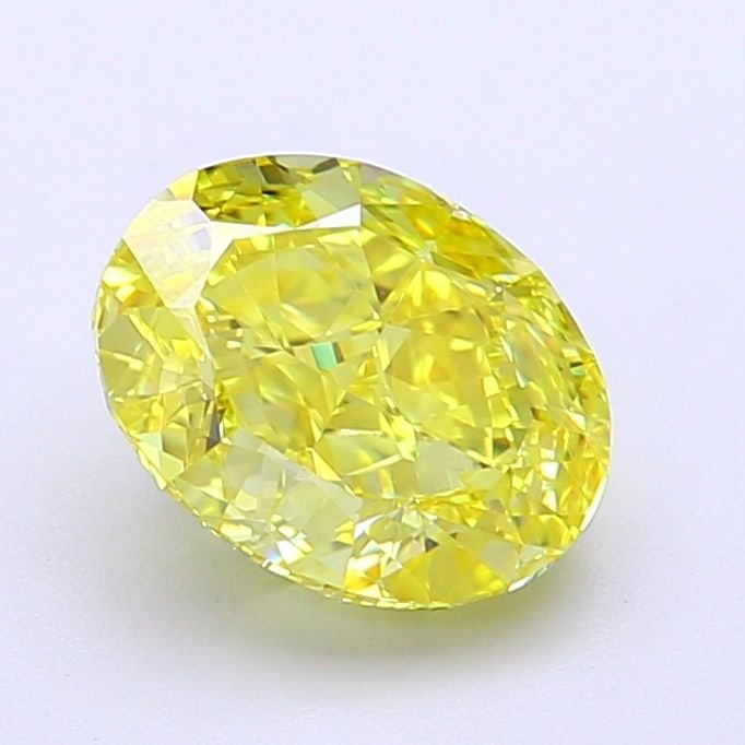 IGI Oval 2.11ct Fancy Vivid Yellow VVS2 Loose Lab Diamond: IGI Oval 2.11ct Fancy Vivid Yellow VVS2 Loose Lab Diamond Experience the vibrant beauty of nature in this stunning 2.11ct Fancy Vivid Yellow VVS2 lab-grown diamond, certified by the International Gemo