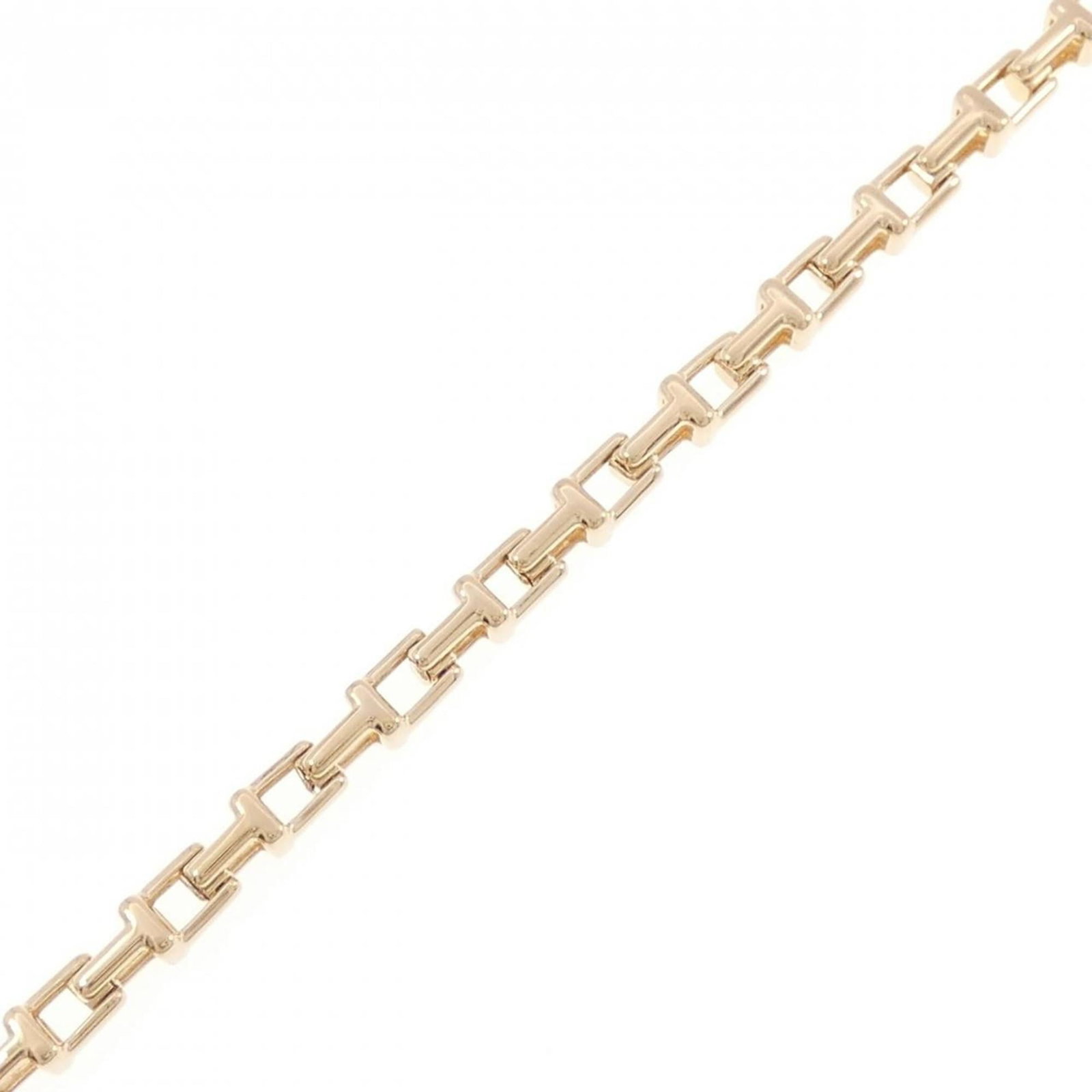 Pink Gold 18K Tiffany Charm Bracelet: Pink Gold 18K Tiffany Charm Bracelet Elevate your style with the iconic Tiffany charm bracelet, crafted from 18K pink gold for a touch of luxury and sophistication. This beautifully worn piece boasts