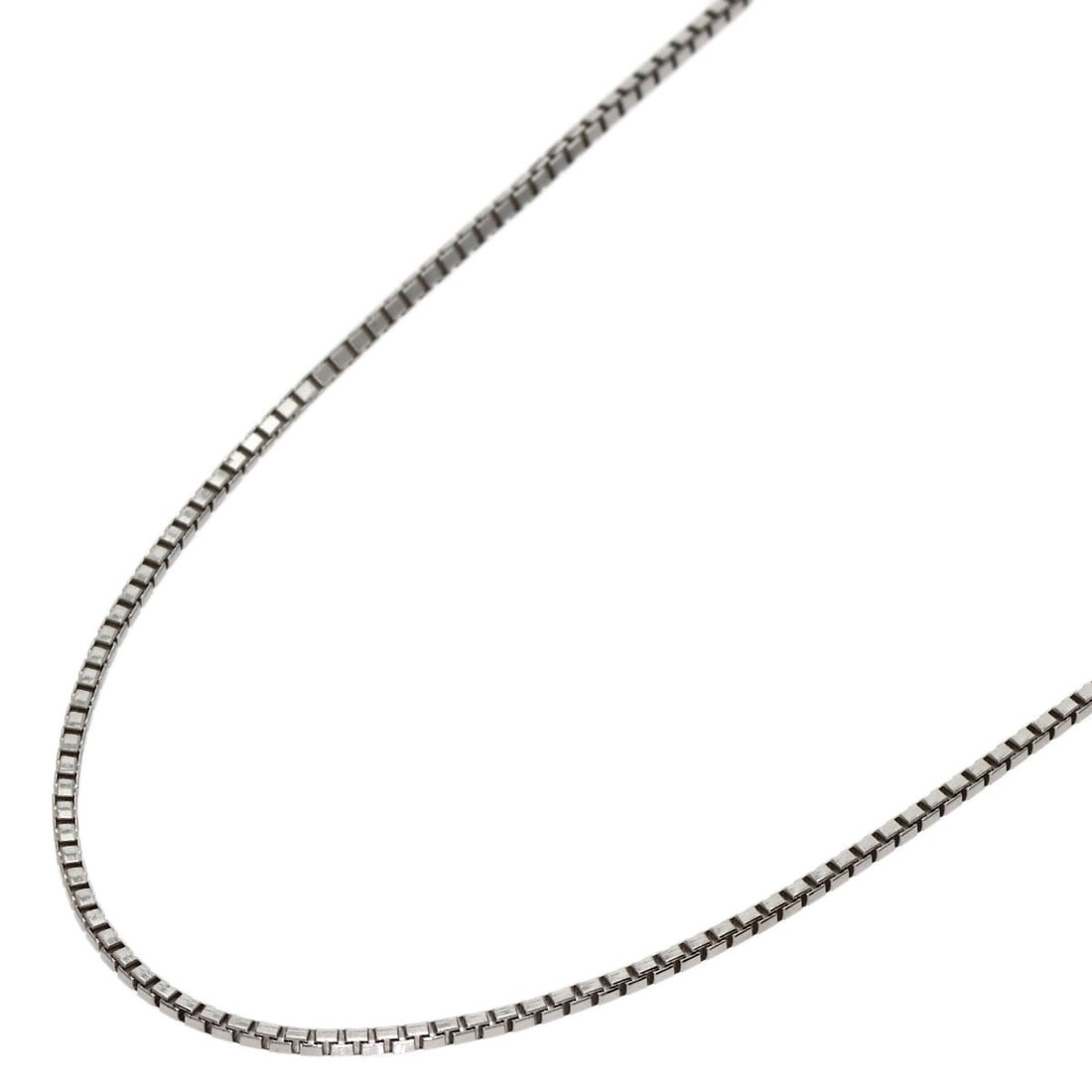 Celine K18 White Gold 16.5" Chain Necklace: Celine K18 White Gold 16.5" Chain Necklace Elevate your style with the Celine K18 White Gold 16.5" Chain Necklace, crafted from high-quality K18 gold for a luxurious feel. This sleek and sophisticated