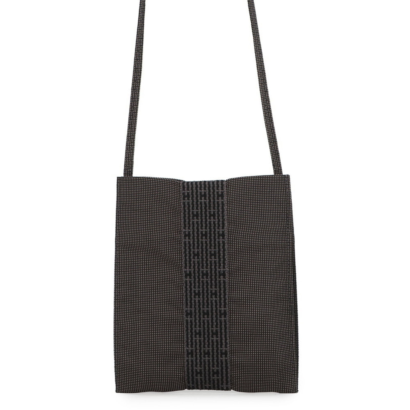 Hermes Canvas Shoulder Bag: Hermes Canvas Shoulder Bag A timeless and versatile canvas shoulder bag from iconic French brand Hermes, boasting a sleek gray hue and open closure for effortless style. In mint condition, this pre-lo