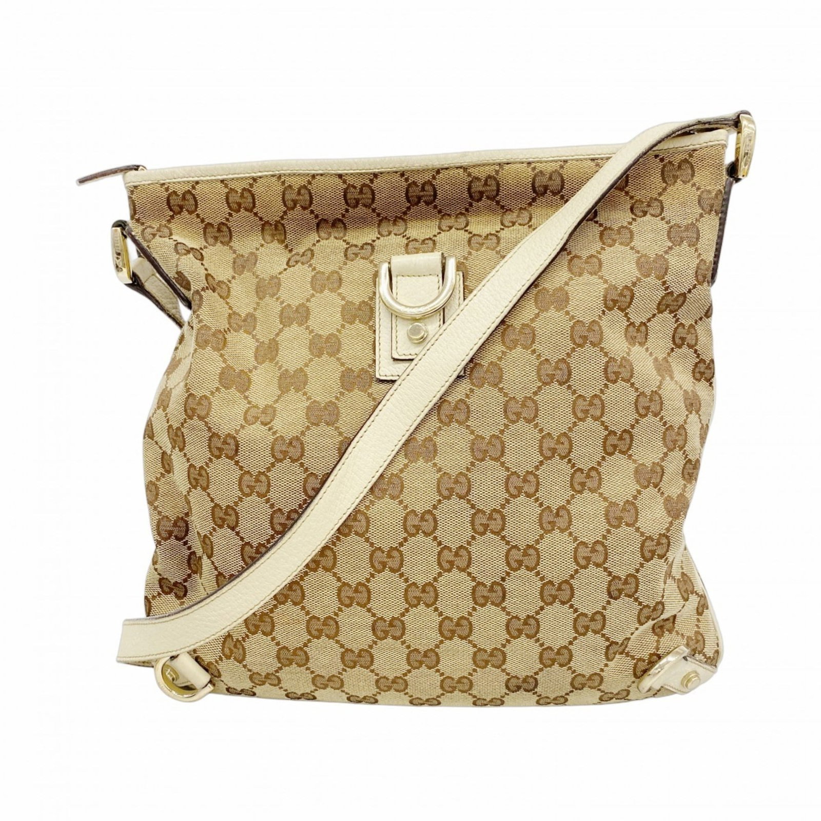 Gucci Canvas Shoulder Bag: Gucci Canvas Shoulder Bag A timeless Gucci canvas shoulder bag in rich brown, adorned with elegant gold hardware, adds a touch of sophistication to any outfit. With its classic design and durable canv