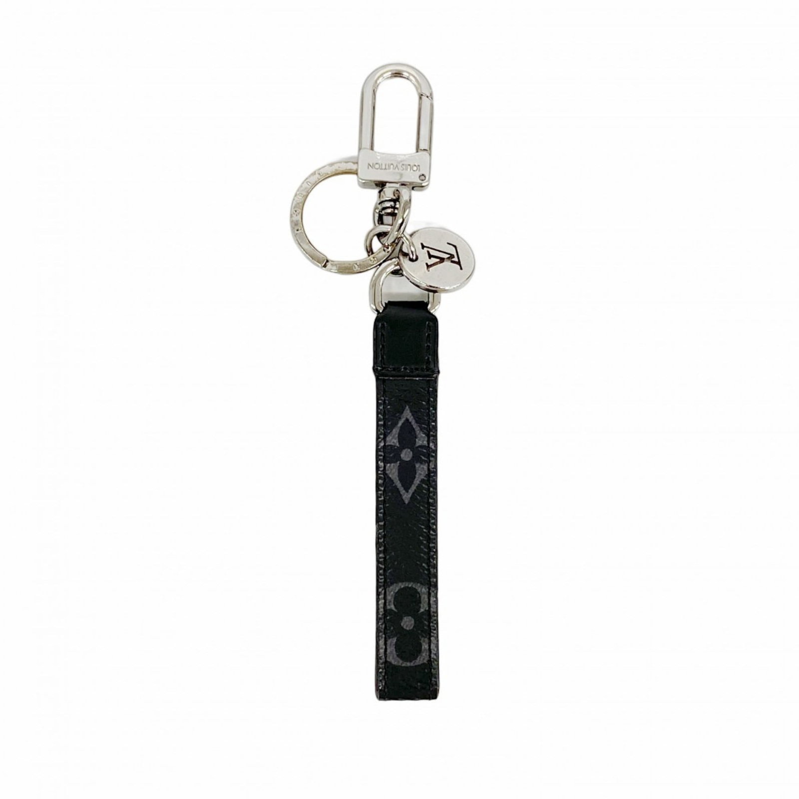 Keyring Louis Vuitton: Keyring Louis Vuitton A sleek and sophisticated accessory for the modern gentleman, this Louis Vuitton keyring boasts the iconic monogram pattern in black and silver tones. With its sturdy design and