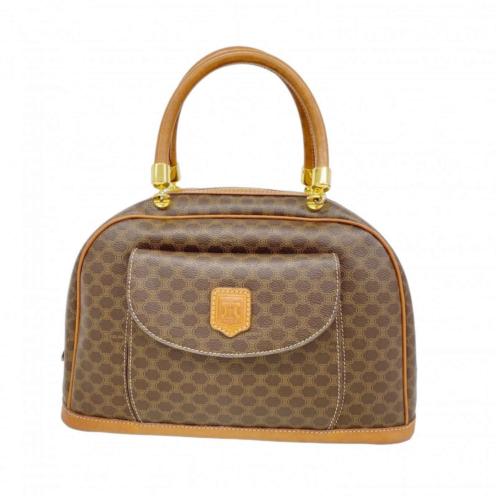 Celine PVC Handbag: Celine PVC Handbag A stylish and durable Celine handbag, crafted from high-quality PVC material, boasts a timeless brown hue and elegant gold hardware details. With its classic design and spacious int
