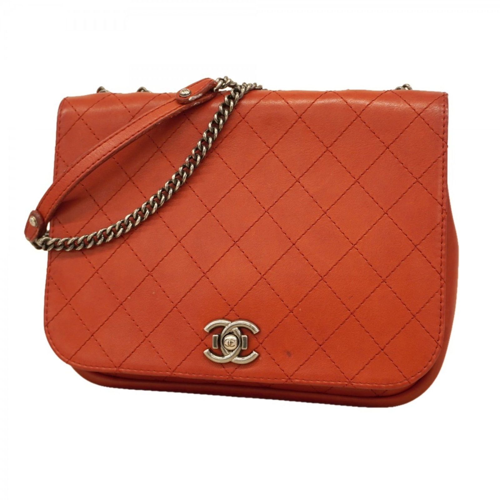 Chanel Leather Shoulder Bag: Chanel Leather Shoulder Bag A vibrant orange or red Chanel leather shoulder bag, adding a pop of color to any outfit, is up for grabs. With its classic design and high-quality leather construction, th
