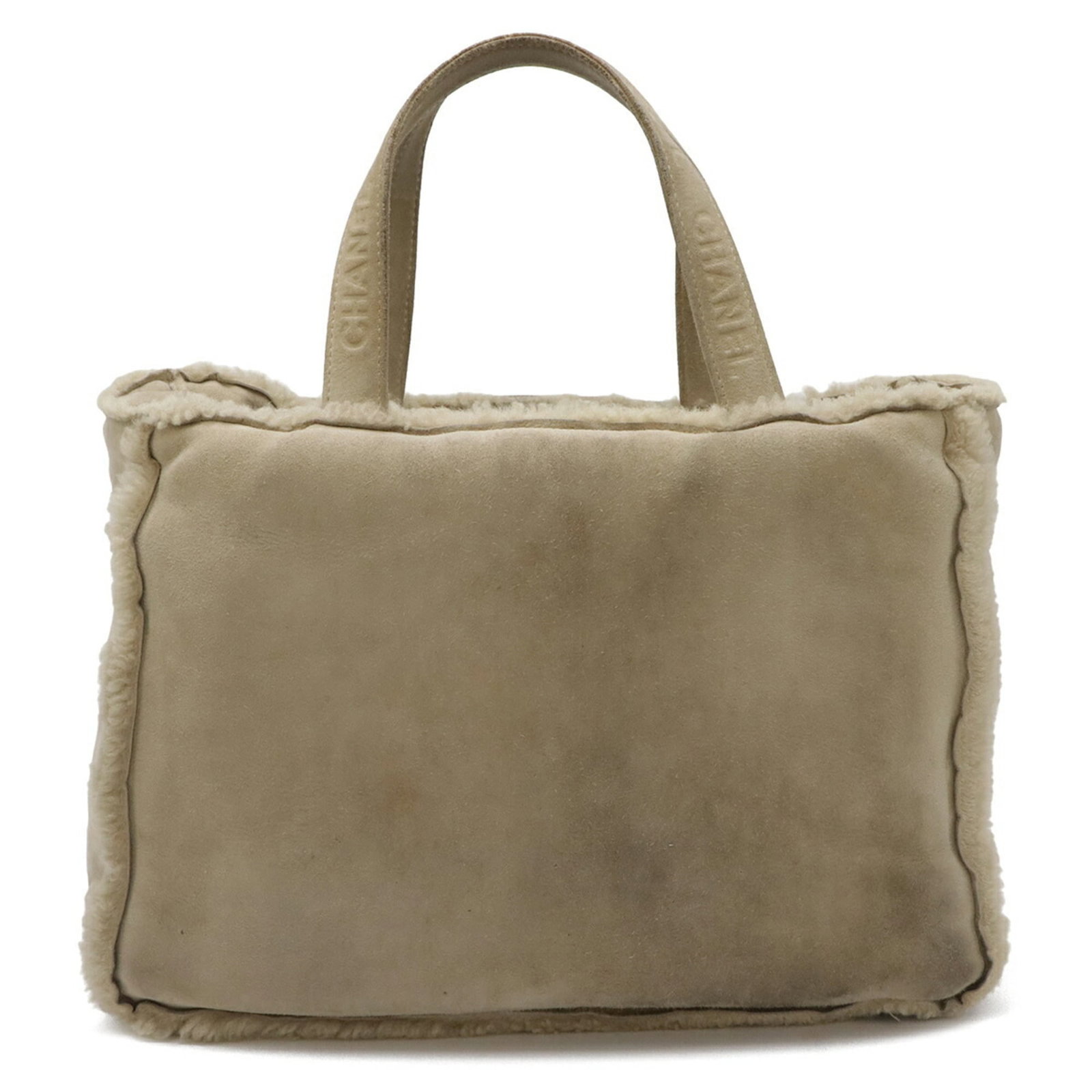Chanel Suede Leather Shoulder Tote Bag: Chanel Suede Leather Shoulder Tote Bag A timeless Chanel Mouton Suede Leather shoulder tote in light beige, perfectly suited for fall and winter. With its classic design and luxurious suede leather ex