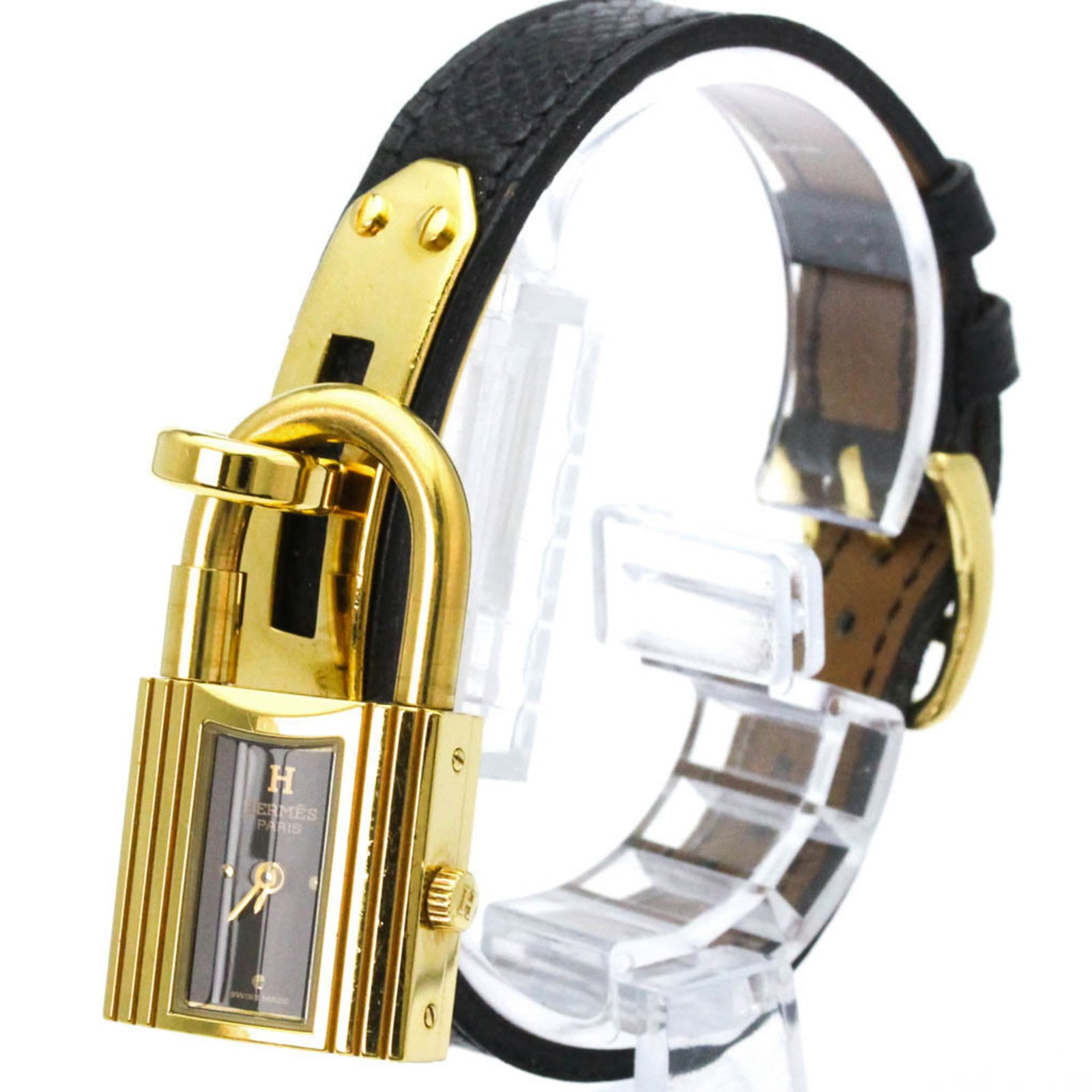 Wristwatch Hermes: Wristwatch Hermes A stunning gold plated Hermes wristwatch, perfect for formal occasions, boasts a sleek 20mm case and elegant black leather strap. With its classic design and sophisticated style, thi