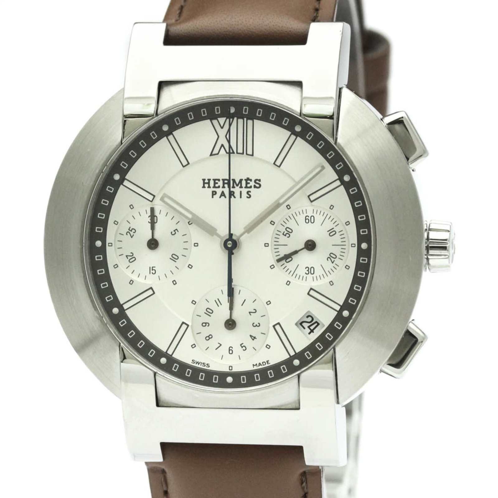 Wristwatch Hermes: Wristwatch Hermes A pre-owned Hermes wristwatch that exudes sporty chic, boasting a sleek 39mm stainless steel case and silver dial, paired with a supple leather strap. With its classic design and dur