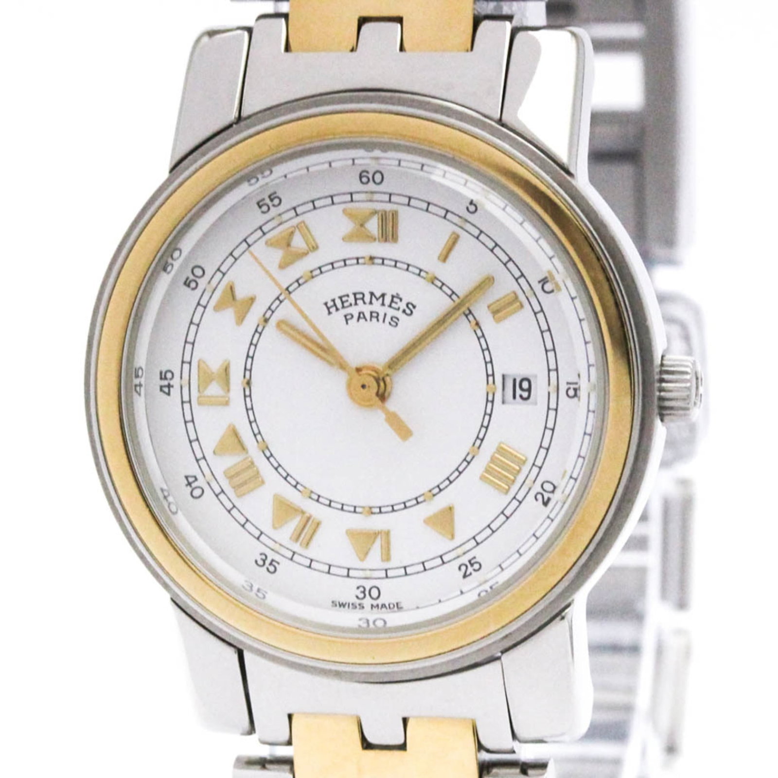 Wristwatch Hermes: Wristwatch Hermes A stunning Herm?s wristwatch, perfect for formal occasions, boasts a sleek 26mm gold plated case and stainless steel band, adding a touch of sophistication to any outfit. The crisp w