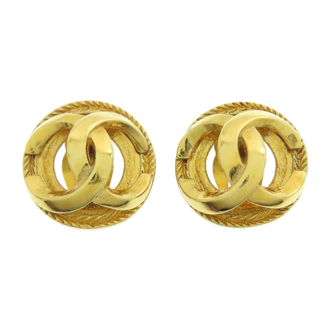 Coco Chanel Mark Earring in Metal: Coco Chanel Mark Earring in Metal A timeless piece from the iconic French fashion house, this Coco Chanel mark earring in gold metal is a masterclass in understated elegance. Its sleek design and sign