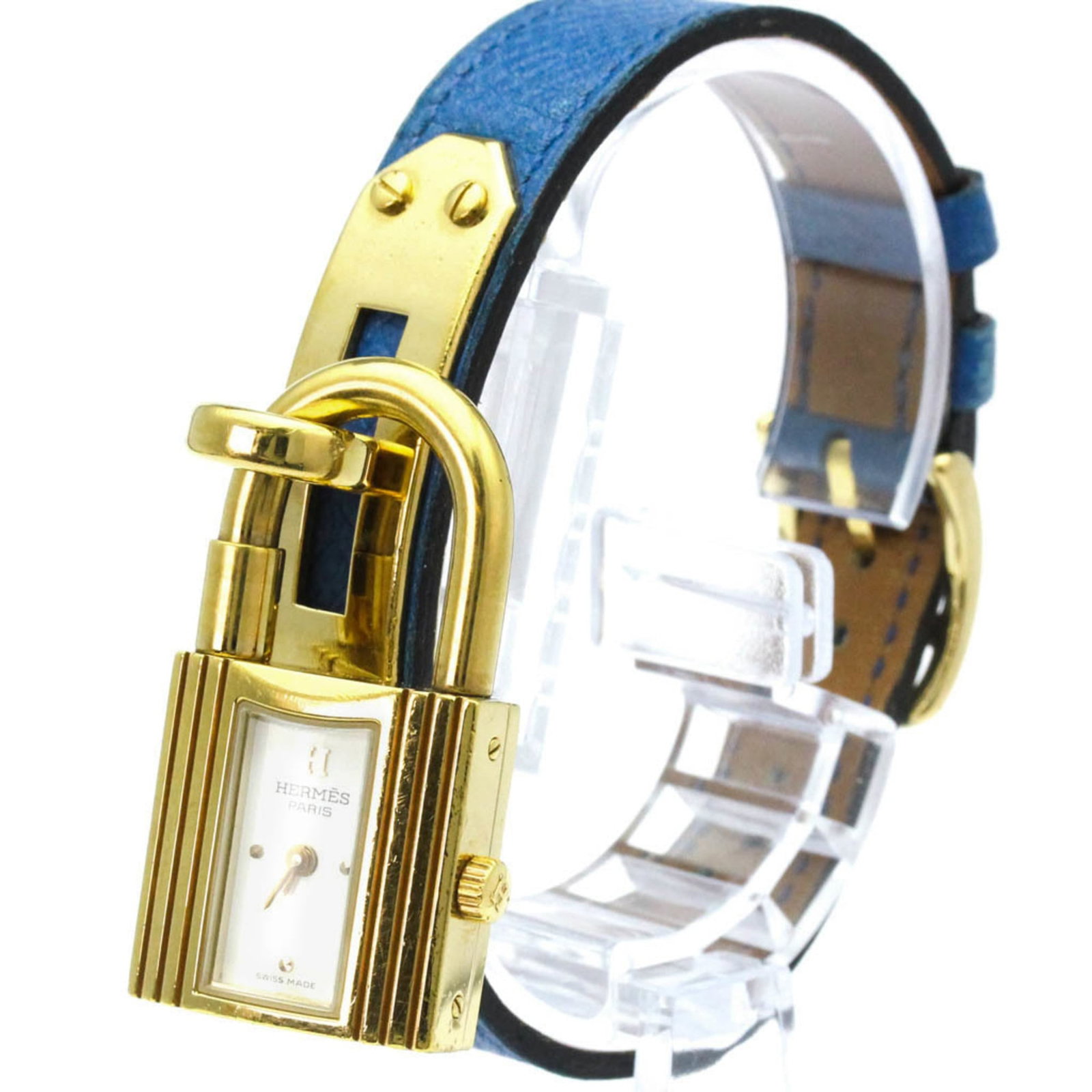 Wristwatch Hermes: Wristwatch Hermes A stunning gold plated Hermes wristwatch, perfect for dressing up any formal occasion, boasts a sleek 20mm white dial and luxurious leather strap. With its classic design and timeles