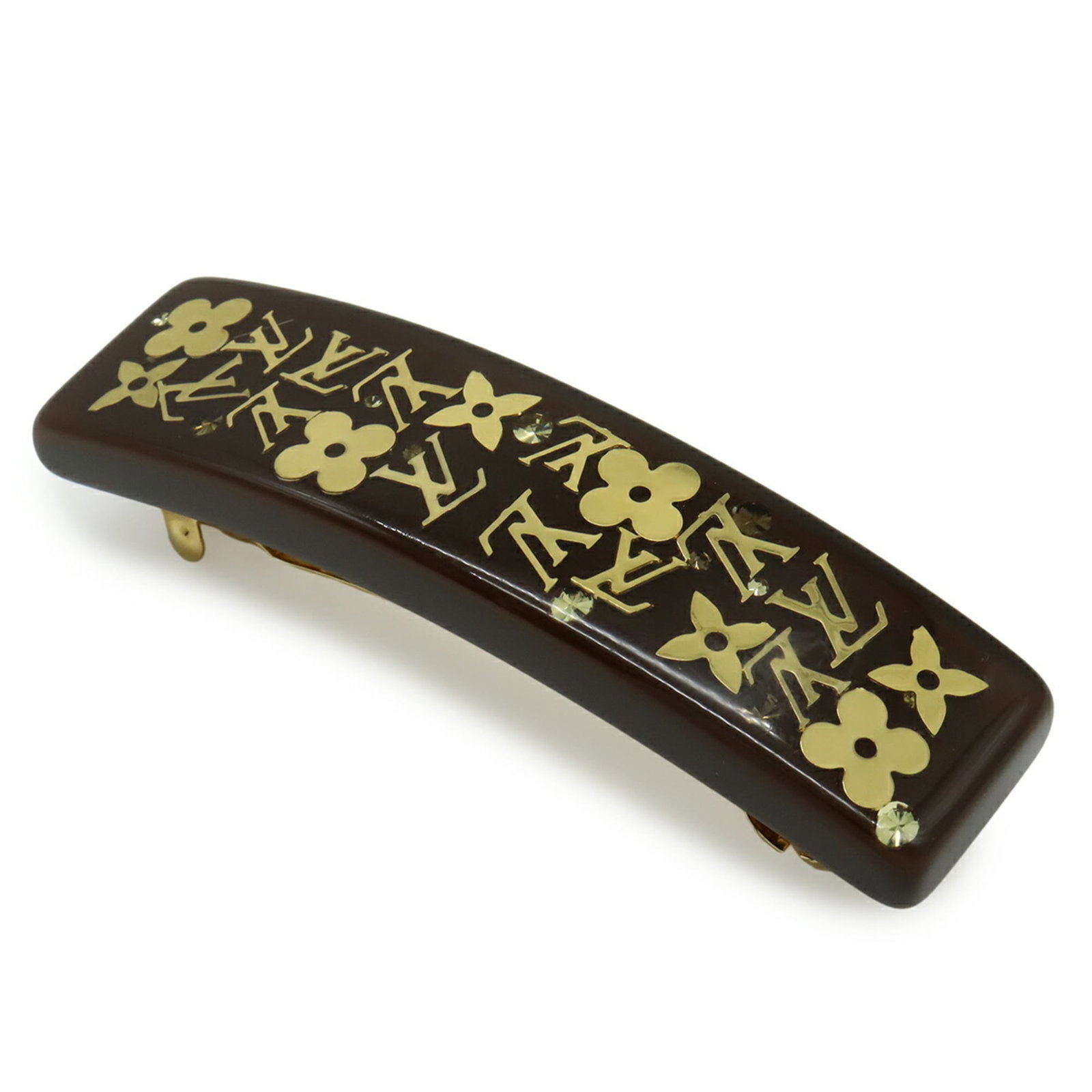 Resin Louis Vuitton Barrette: Resin Louis Vuitton Barrette A stunning resin Louis Vuitton barrette, boasting the iconic monogram pattern in dark brown and gold accents, adds a touch of luxury to any hairstyle. With its sleek